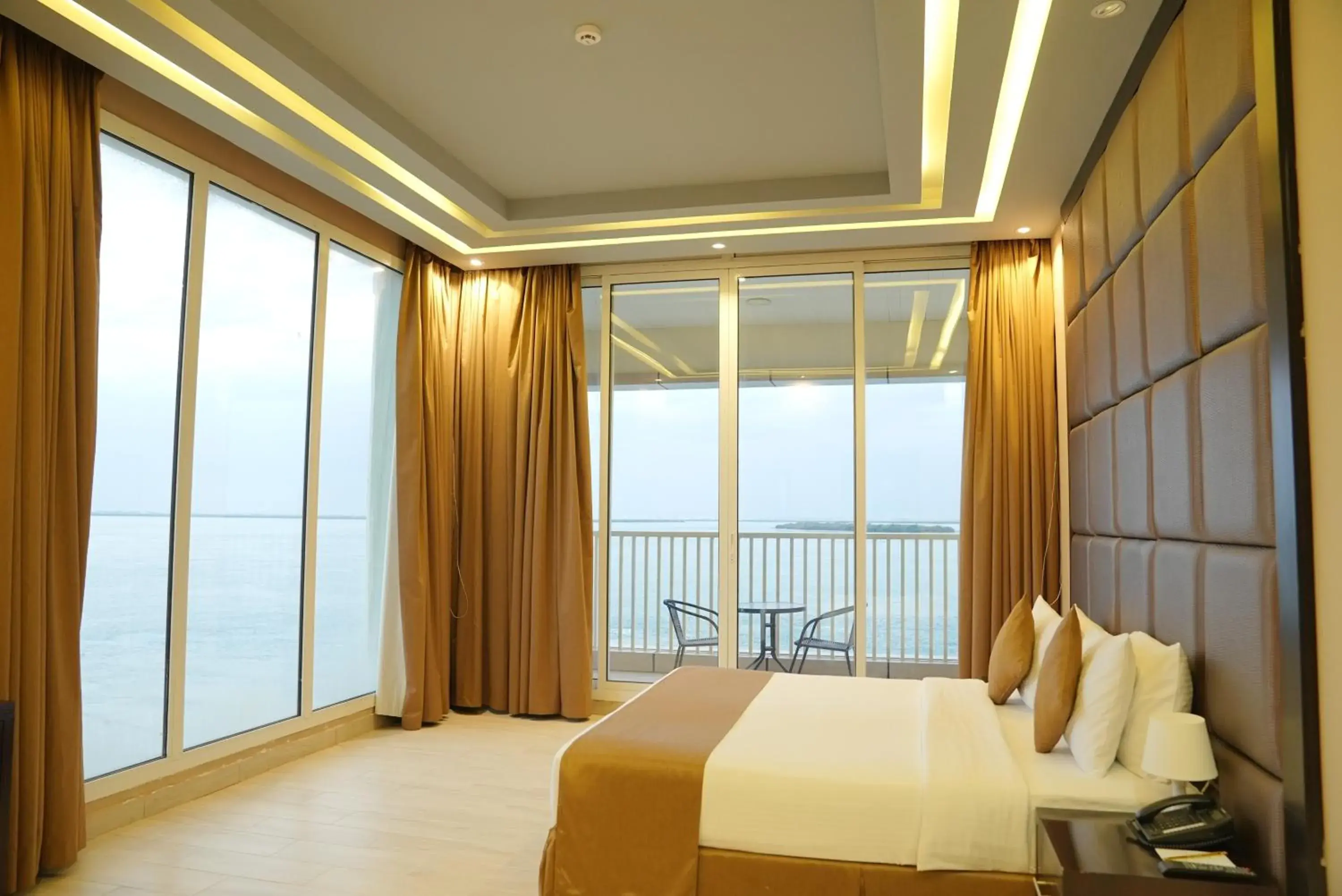 Bed in Flamingo Beach Hotel Bed in Flamingo Beach Hotel