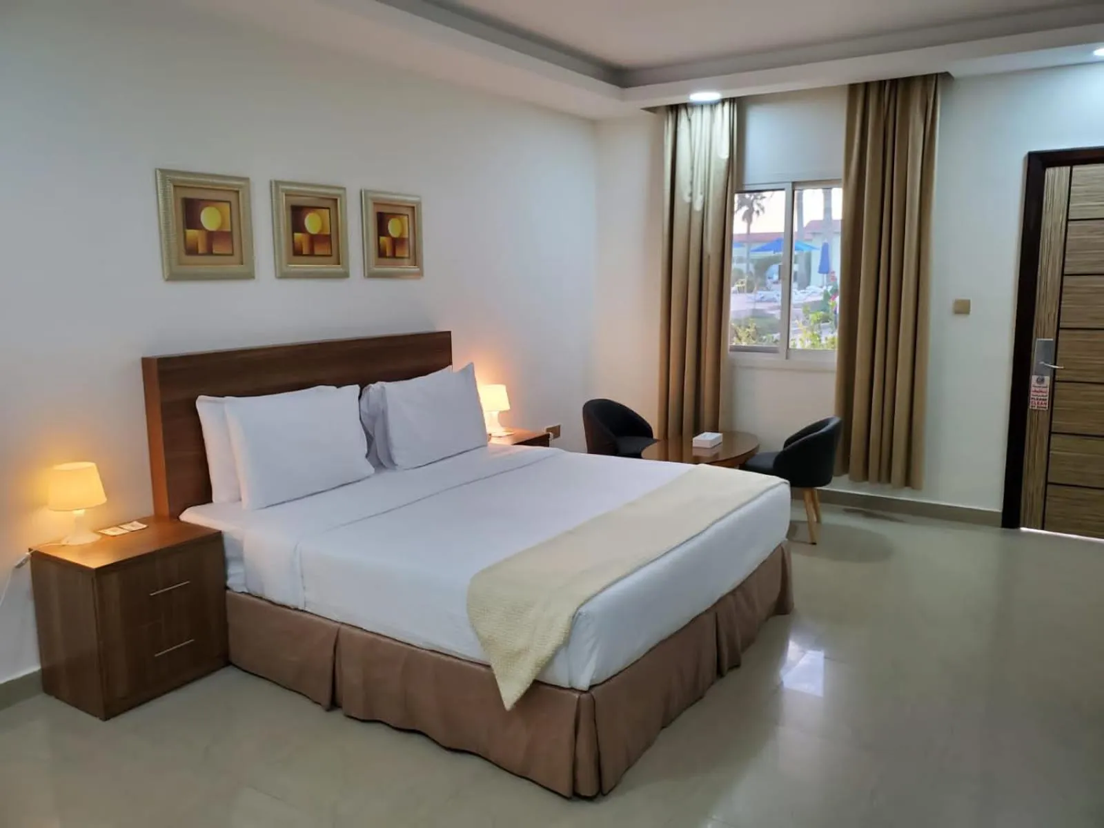 Bed in Flamingo Beach Hotel