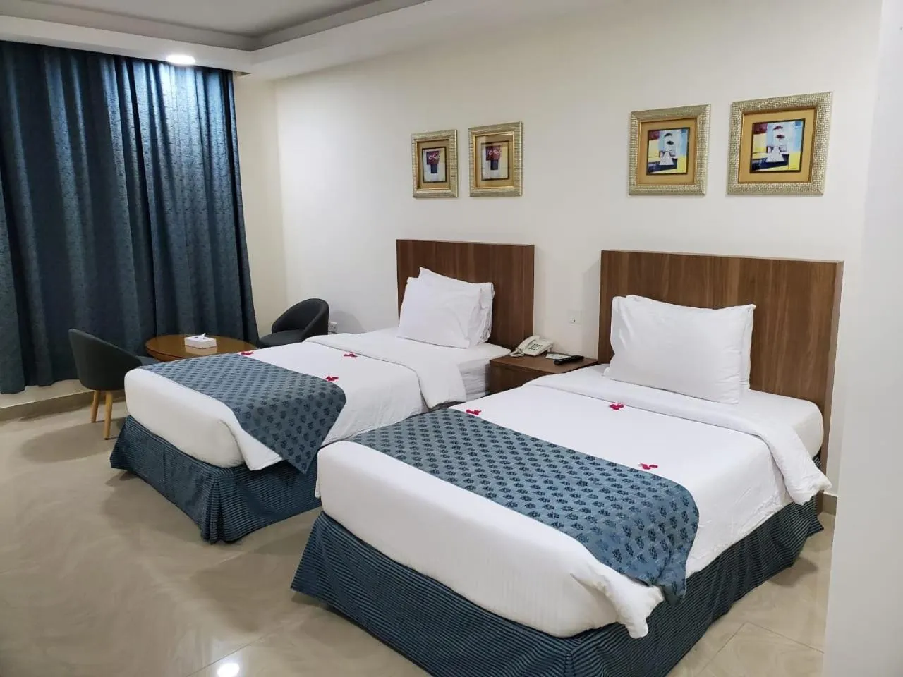 Bed in Flamingo Beach Hotel