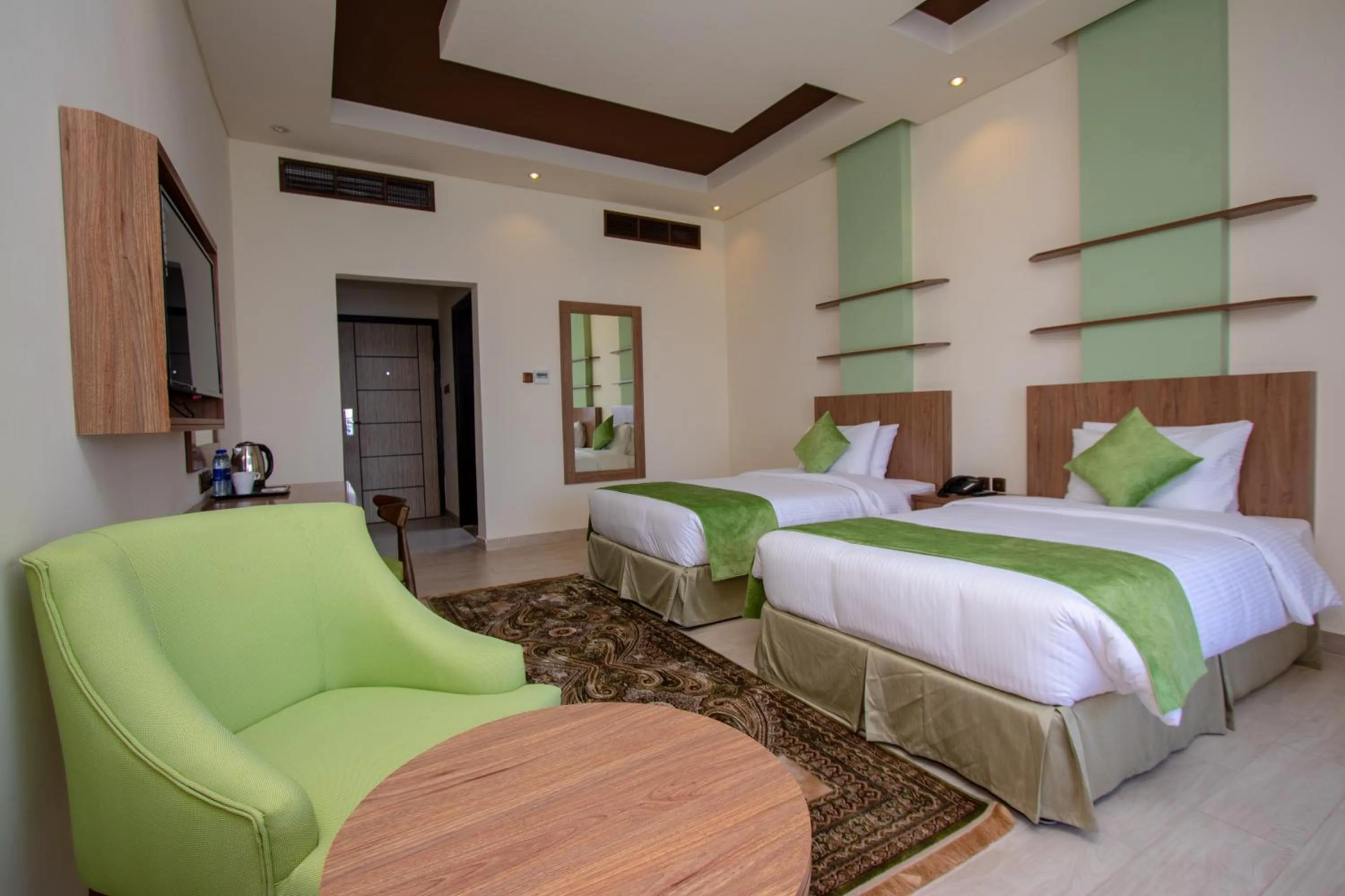 Bed in Flamingo Beach Hotel