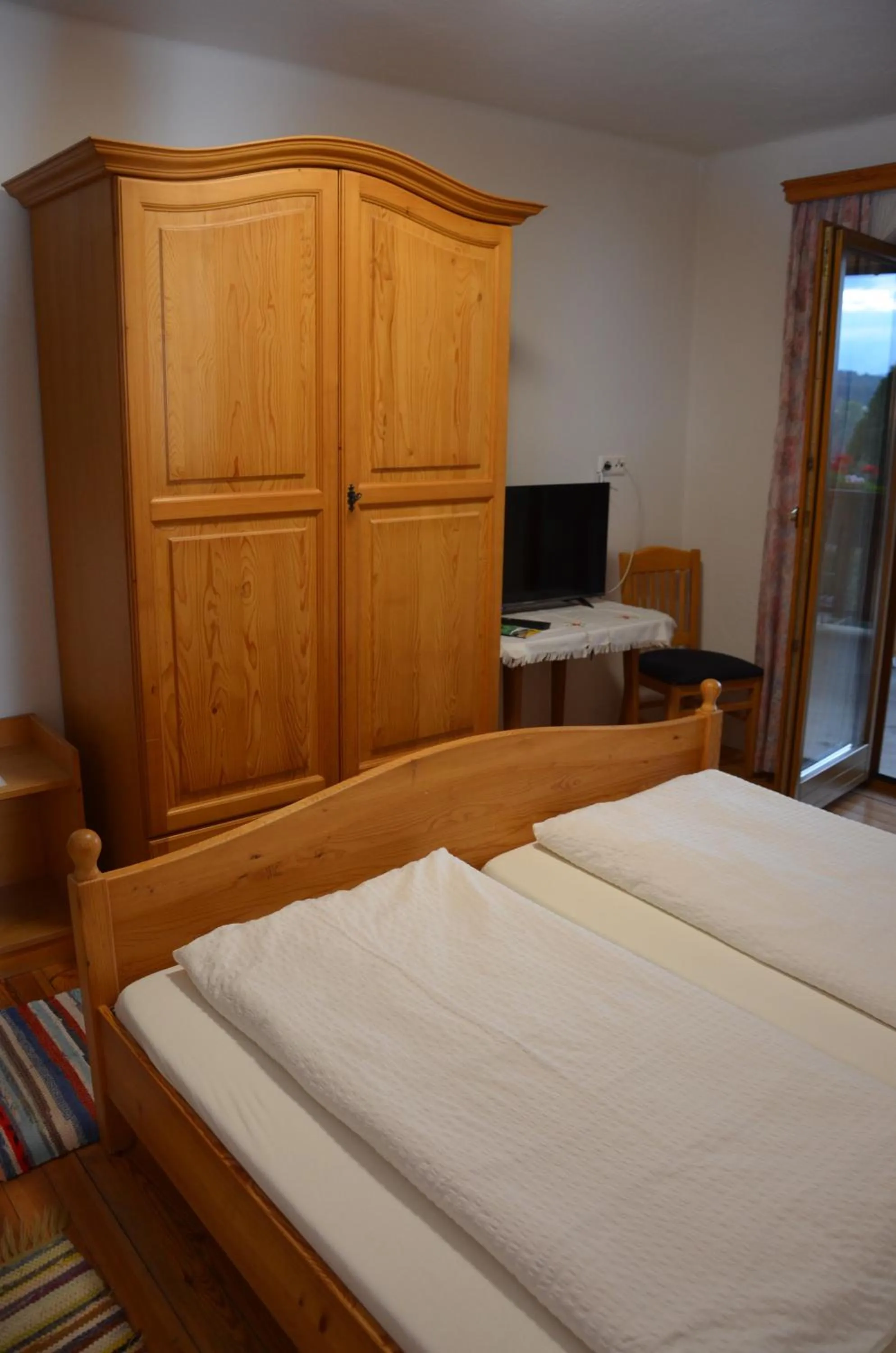 Photo of the whole room, Bed in Gasthof Jauk-Hartner