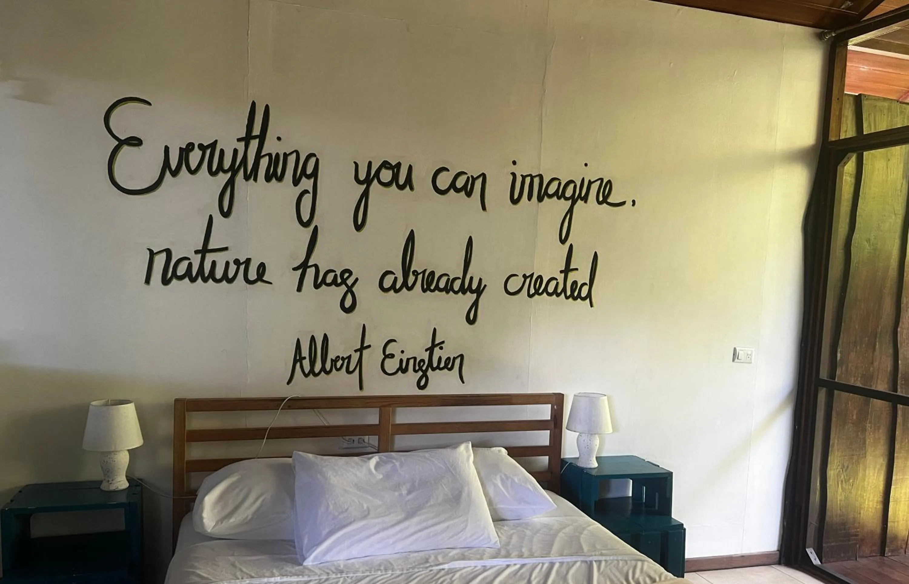 Bed in Ranchos Remo Lodge