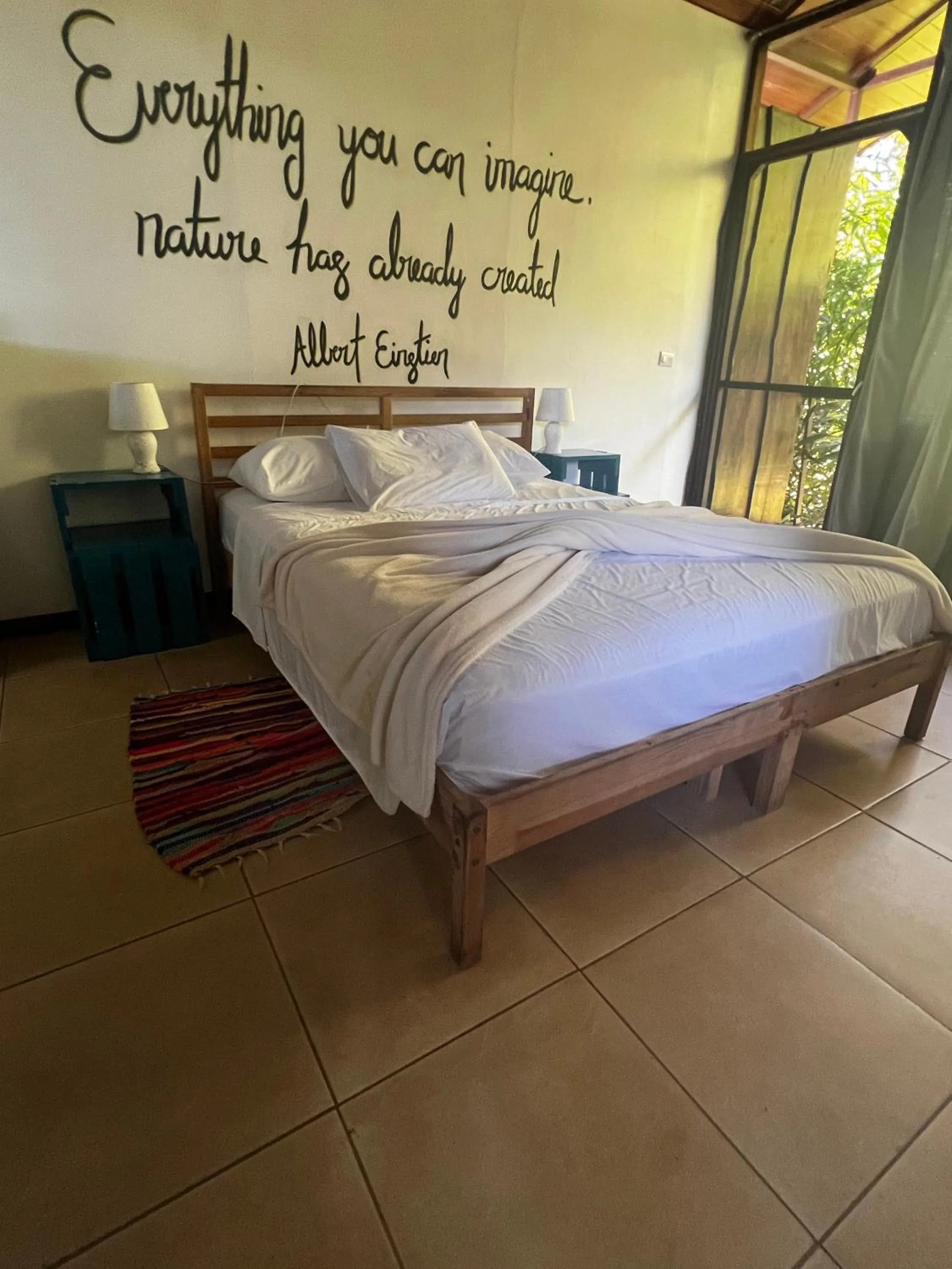 Bed in Ranchos Remo Lodge