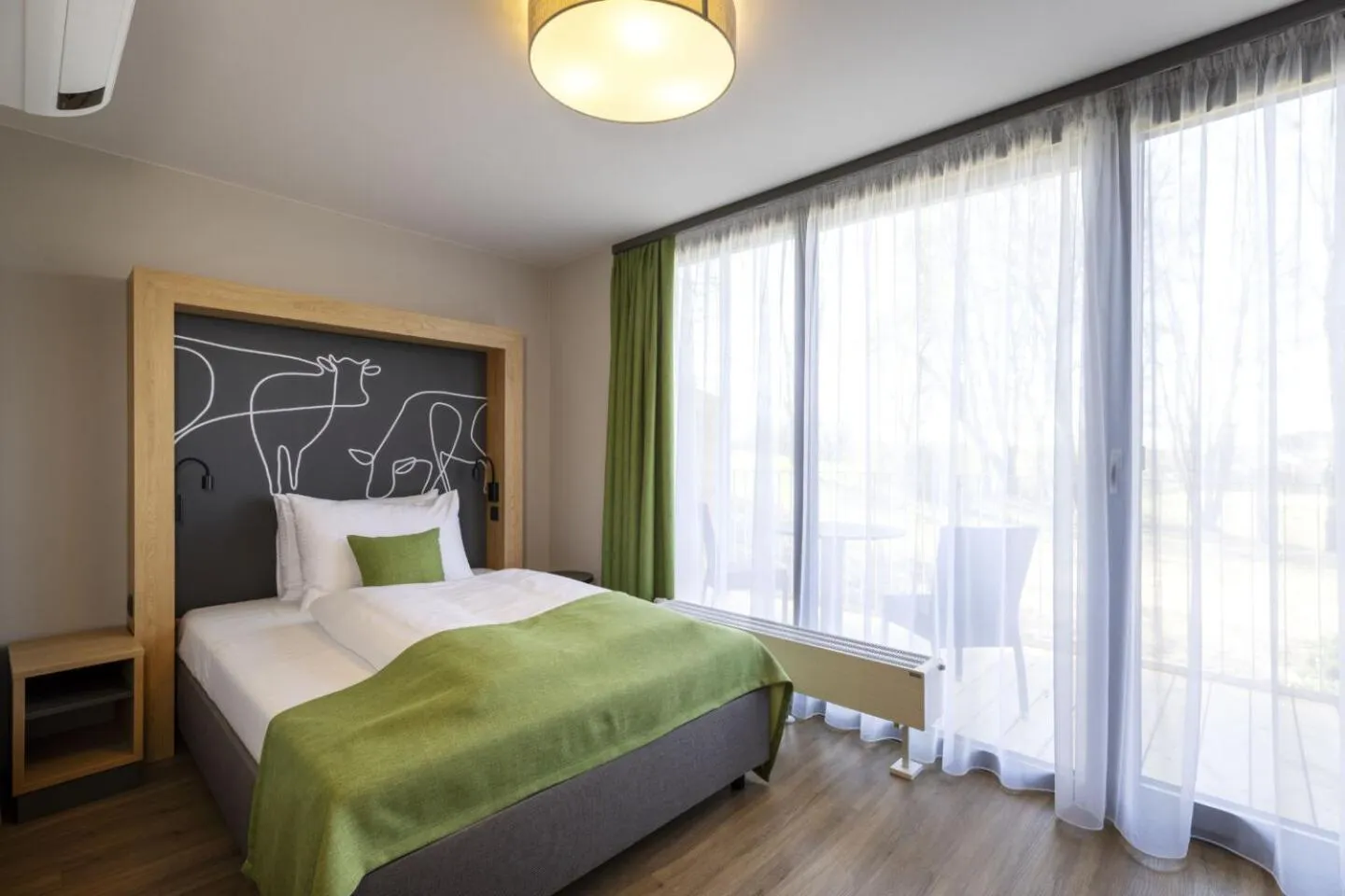 Bed in JUFA Hotel Wangen im Allgäu