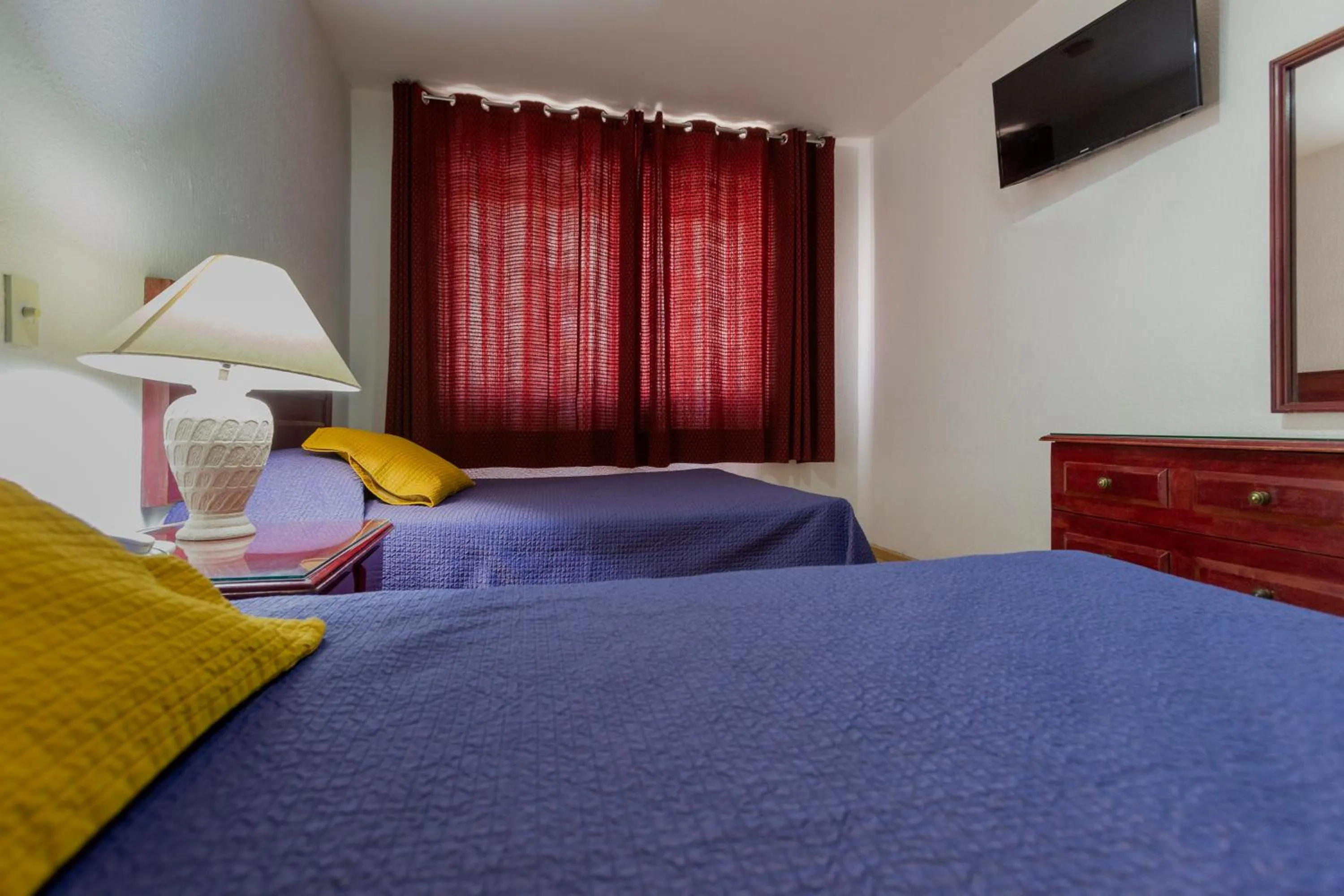 Bed in Hotel Gala Oaxaca