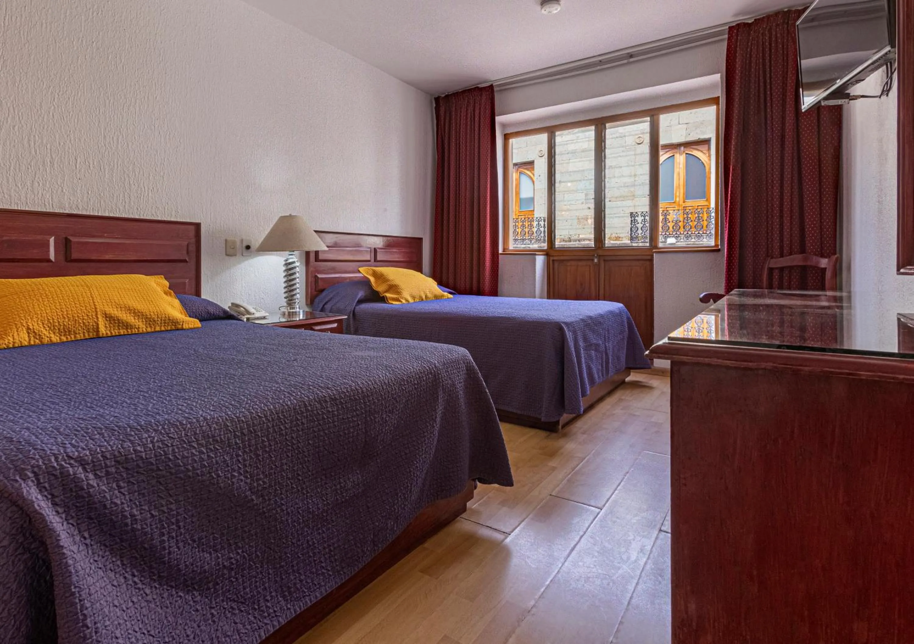 Bed in Hotel Gala Oaxaca