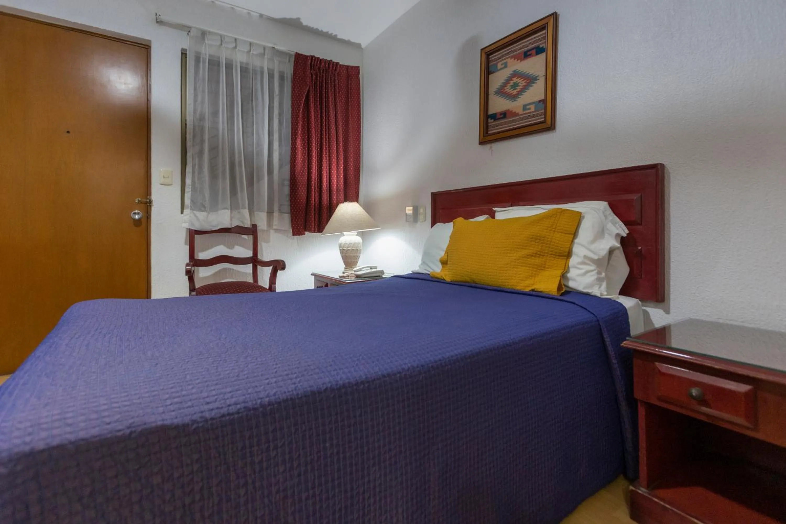 Bed in Hotel Gala Oaxaca