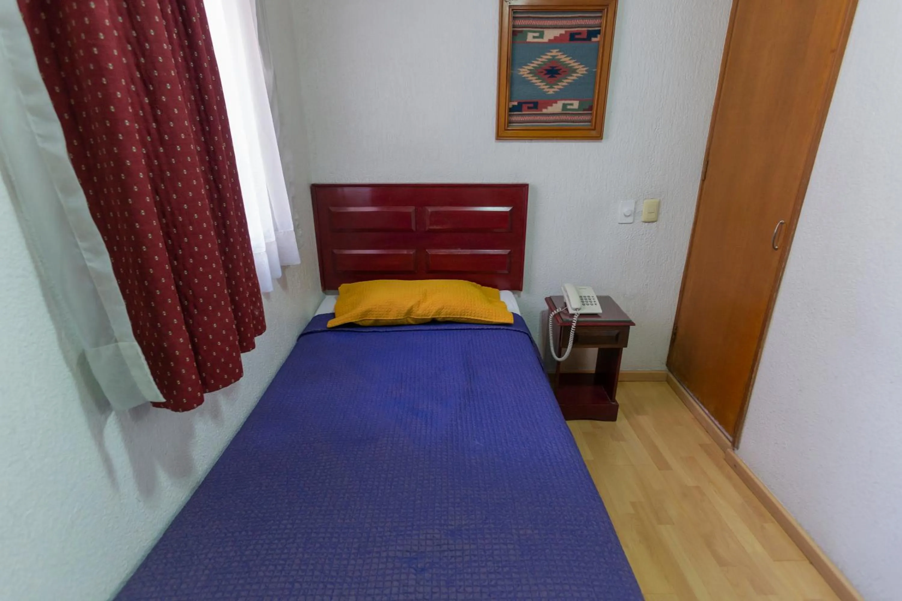 Bed in Hotel Gala Oaxaca