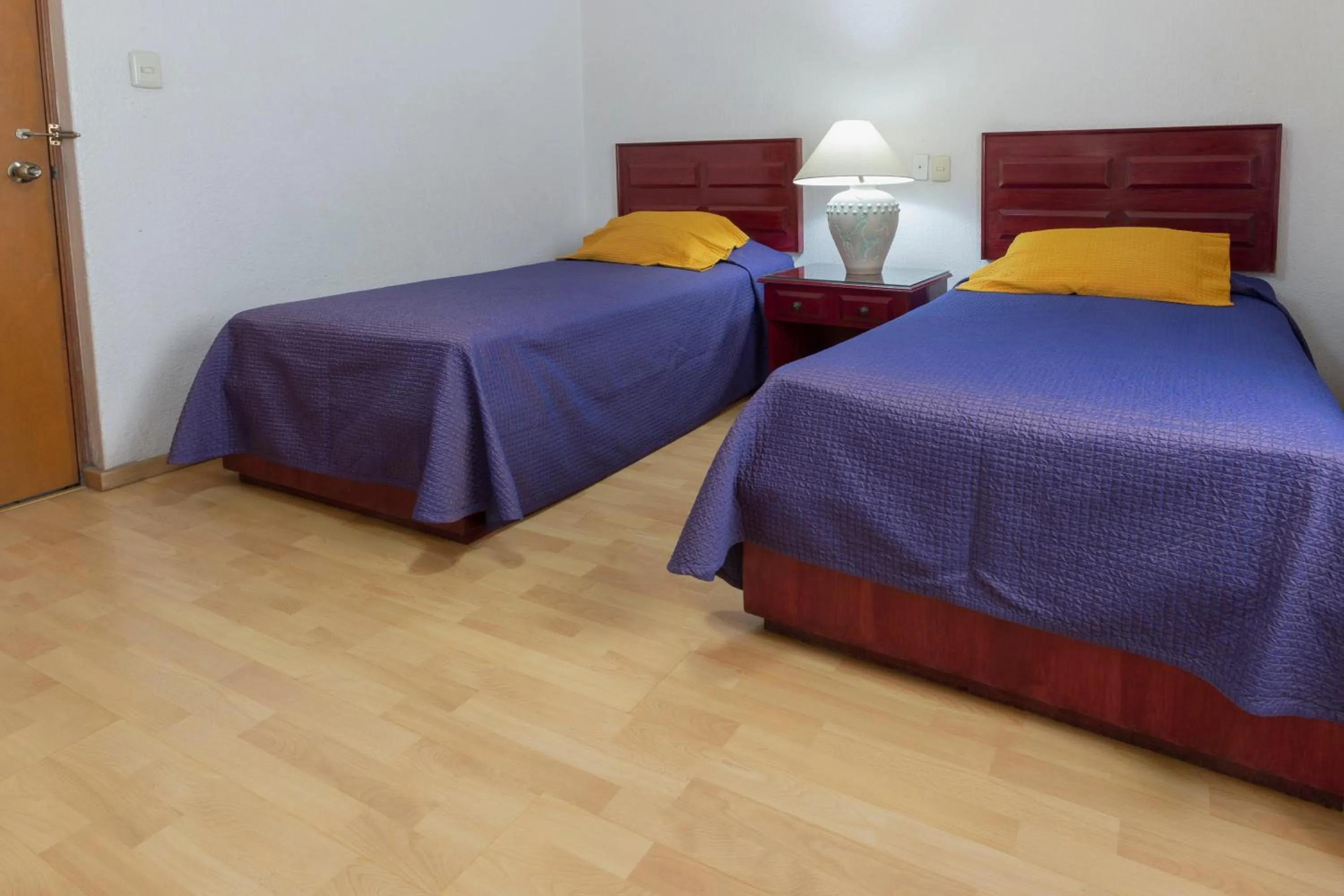 Bed in Hotel Gala Oaxaca