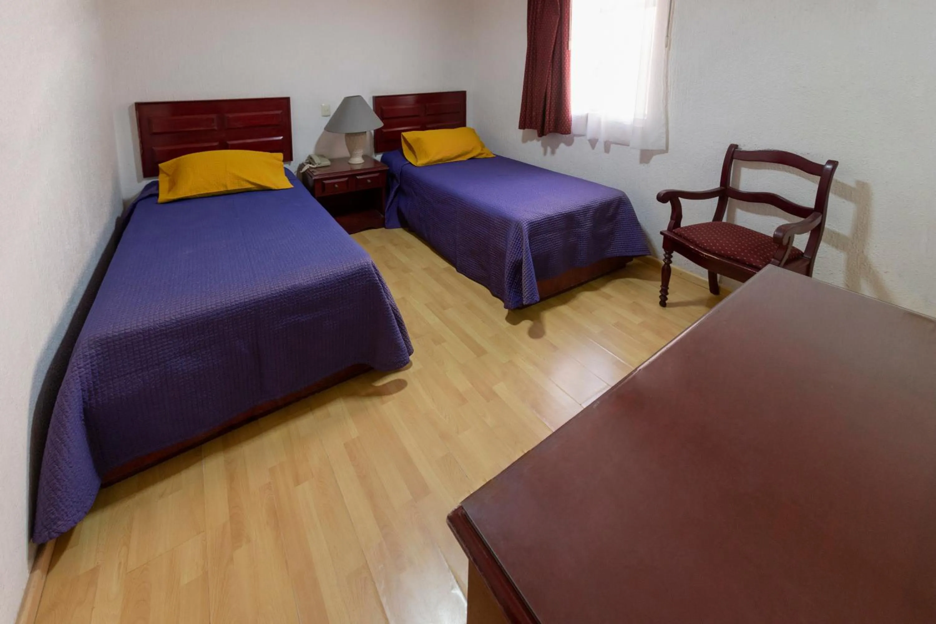 Bed in Hotel Gala Oaxaca