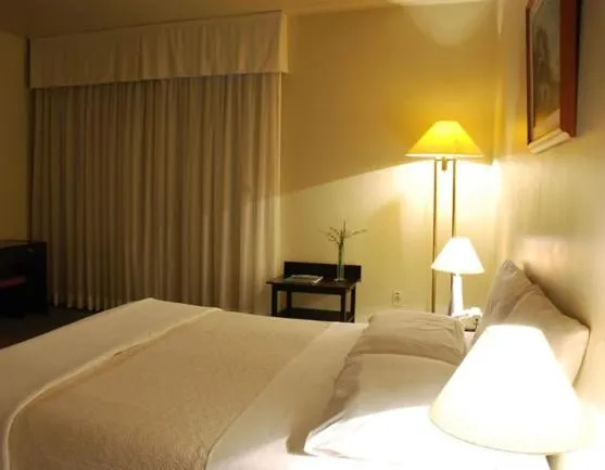 Bed in Planalto Hotel