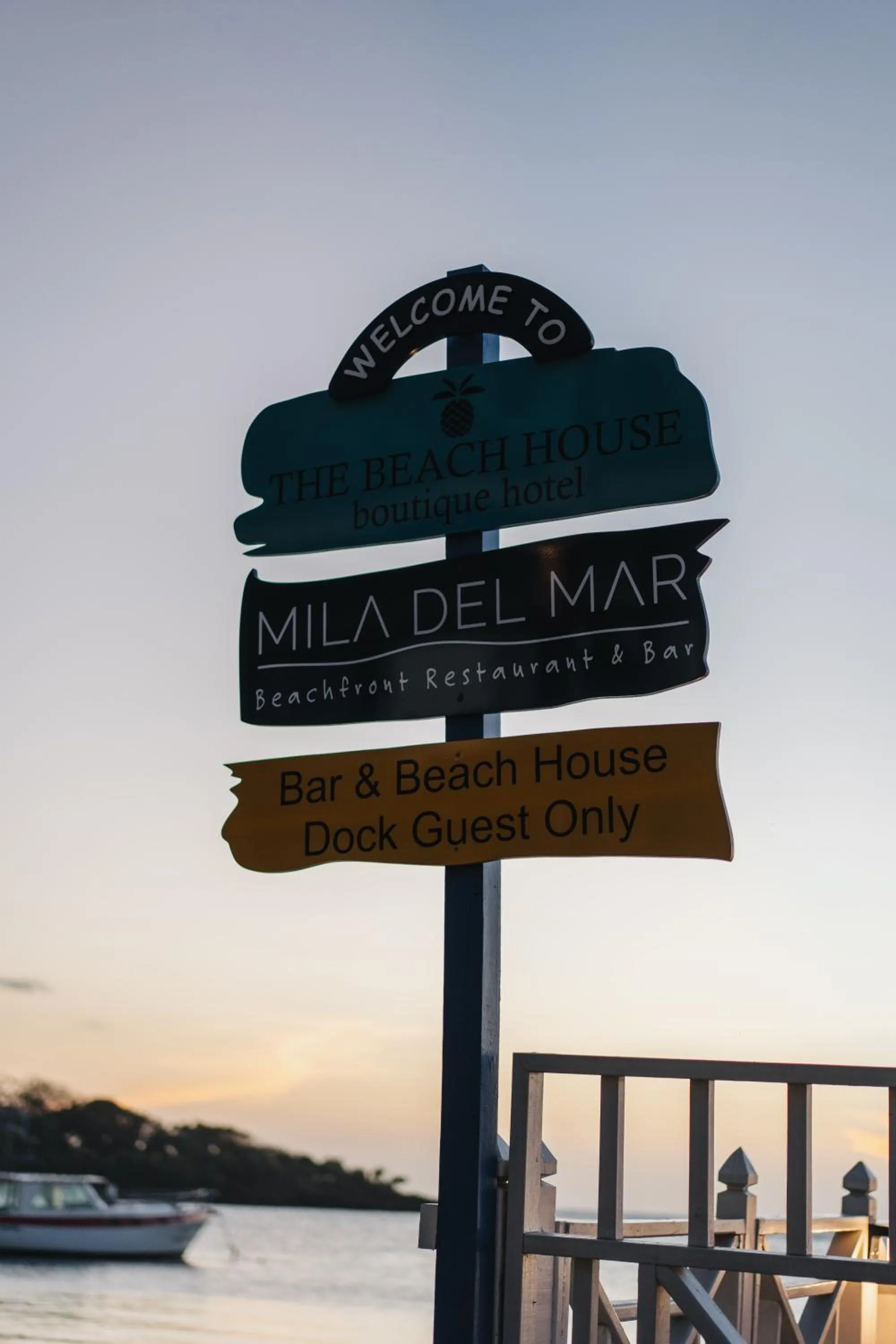 Property logo or sign in The Beach House Boutique Hotel