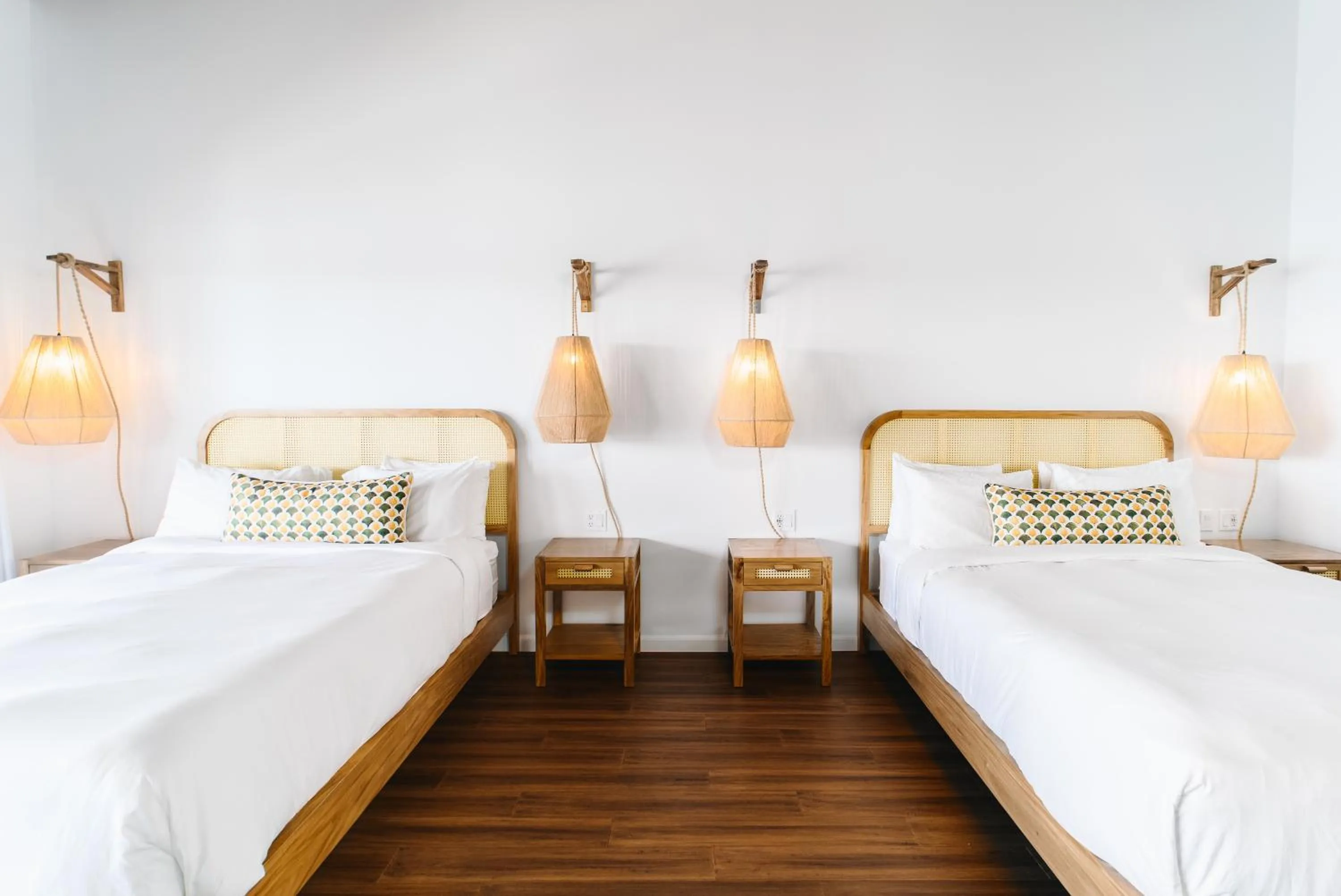 Bed in The Beach House Boutique Hotel