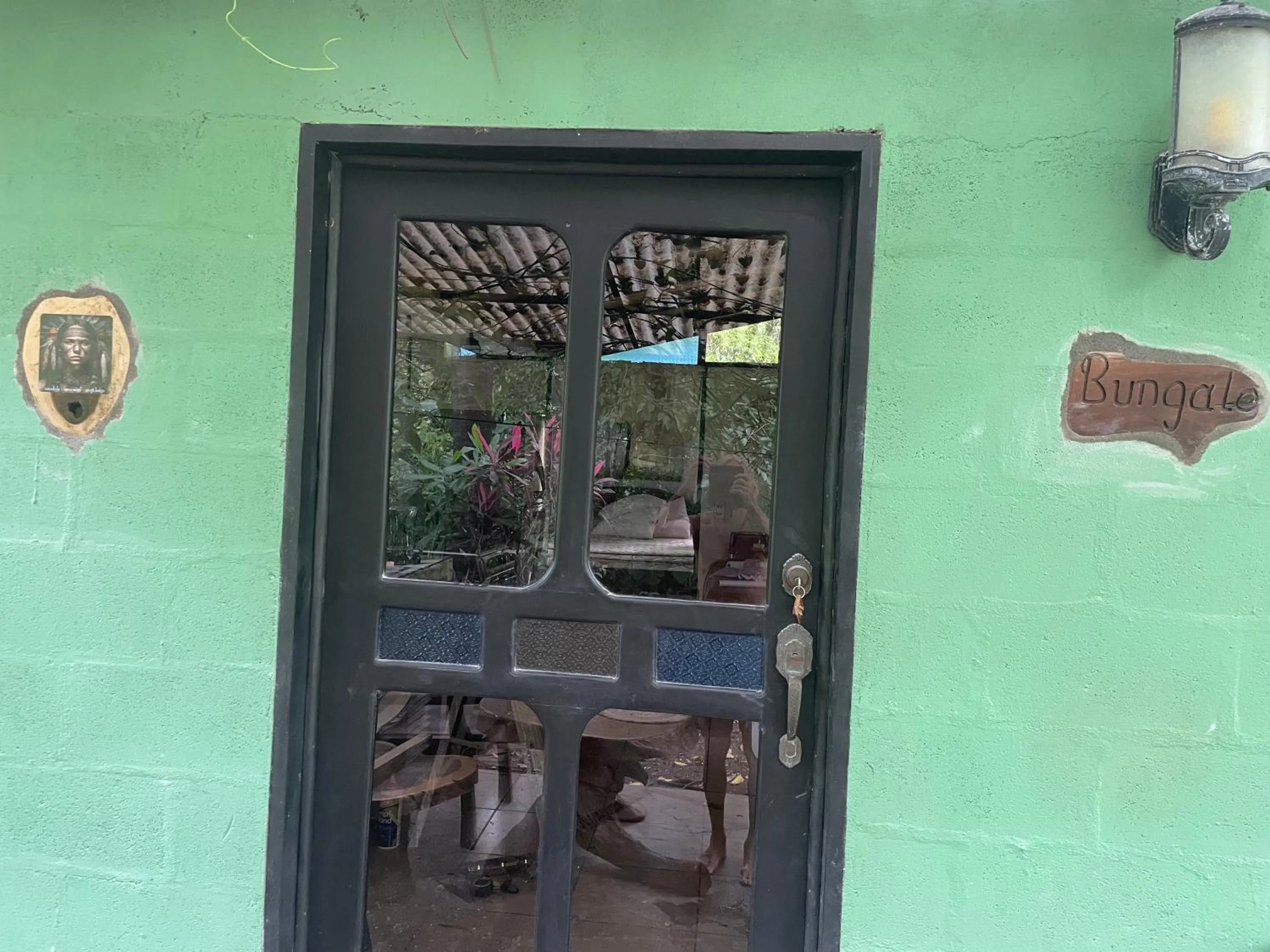Facade/entrance in spirit of jungle lodge