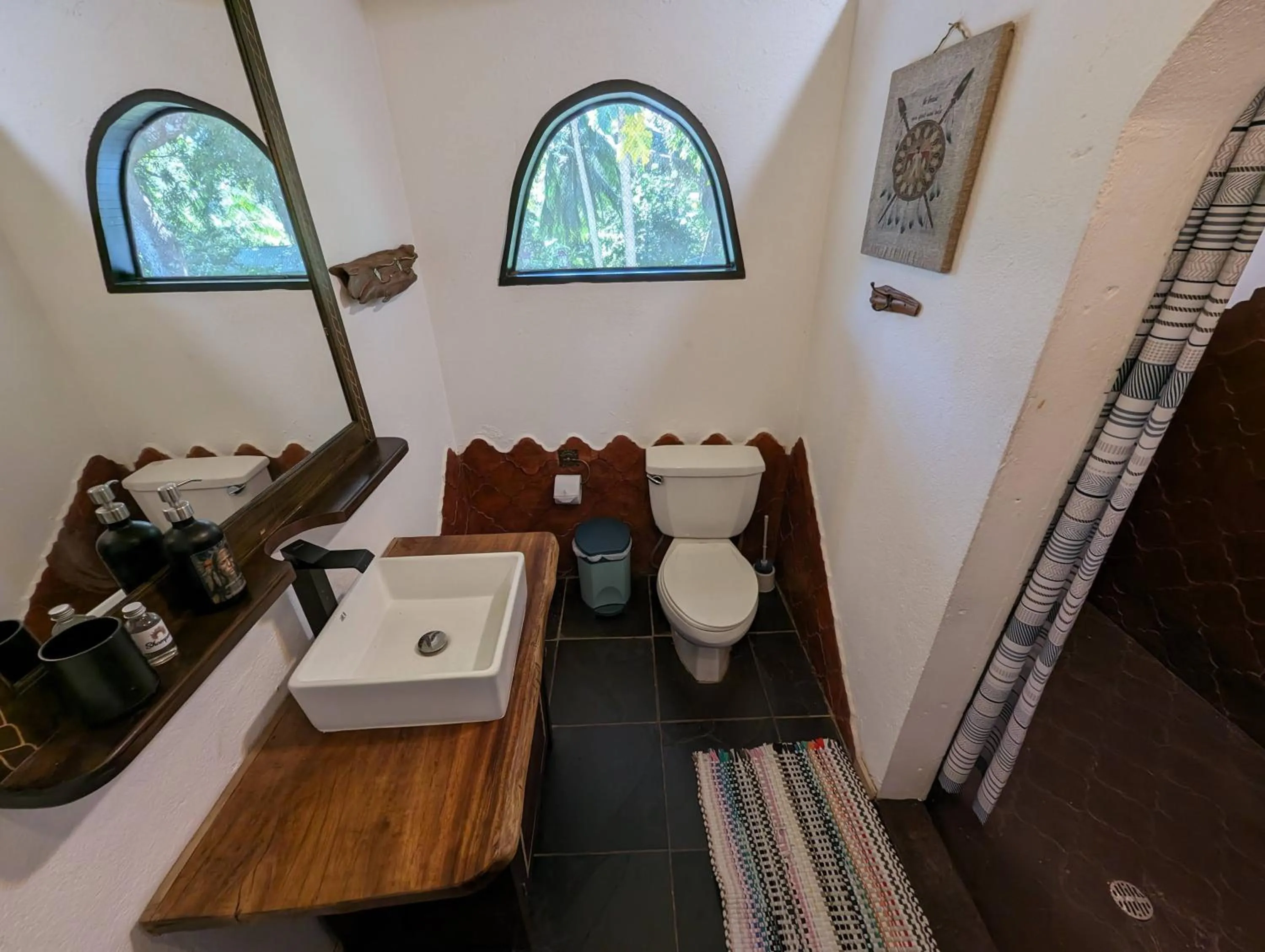 Toilet in spirit of jungle lodge