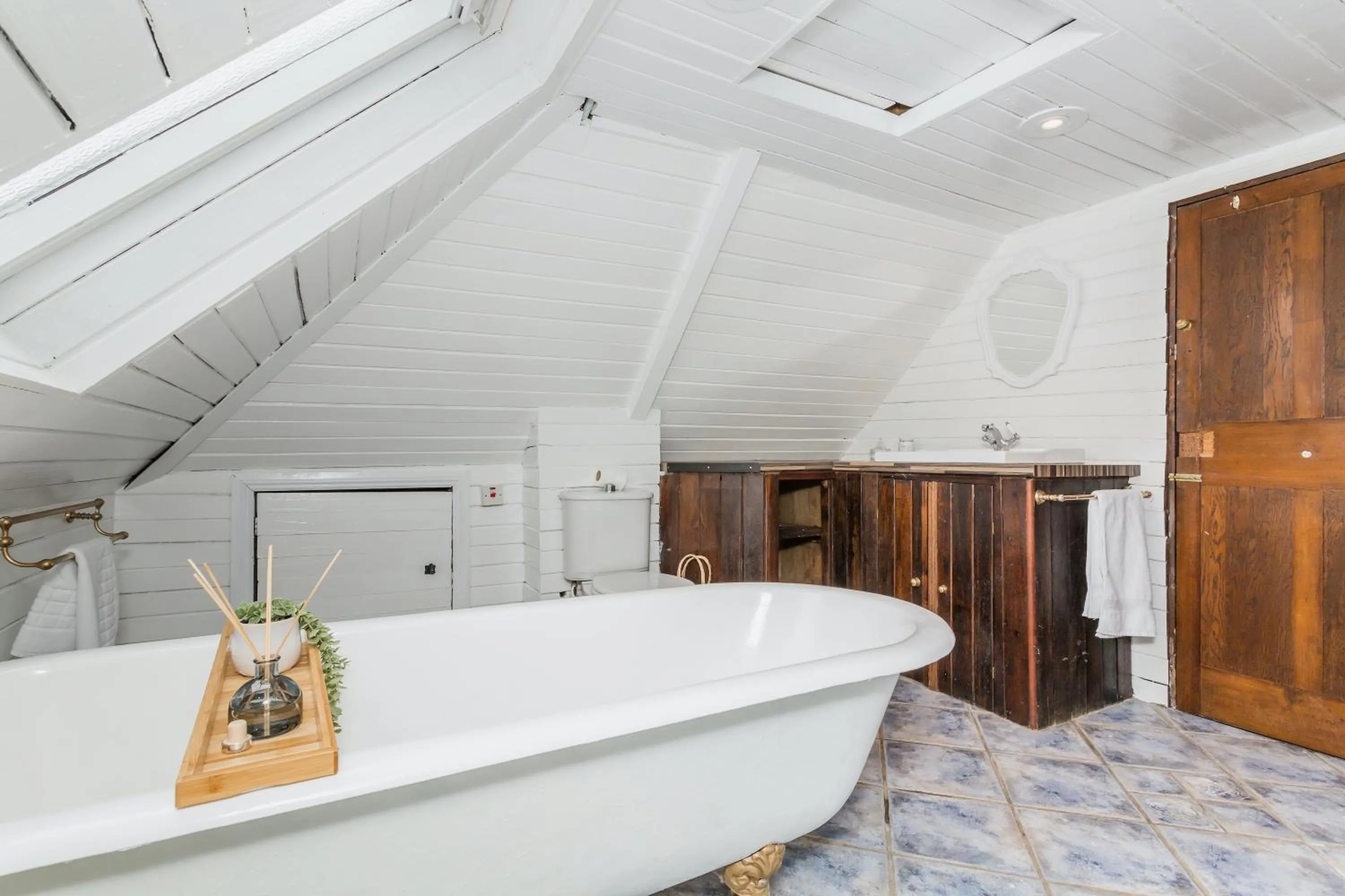 Bathroom in Dyke Farm Barn near Brighton by Huluki Sussex Stays