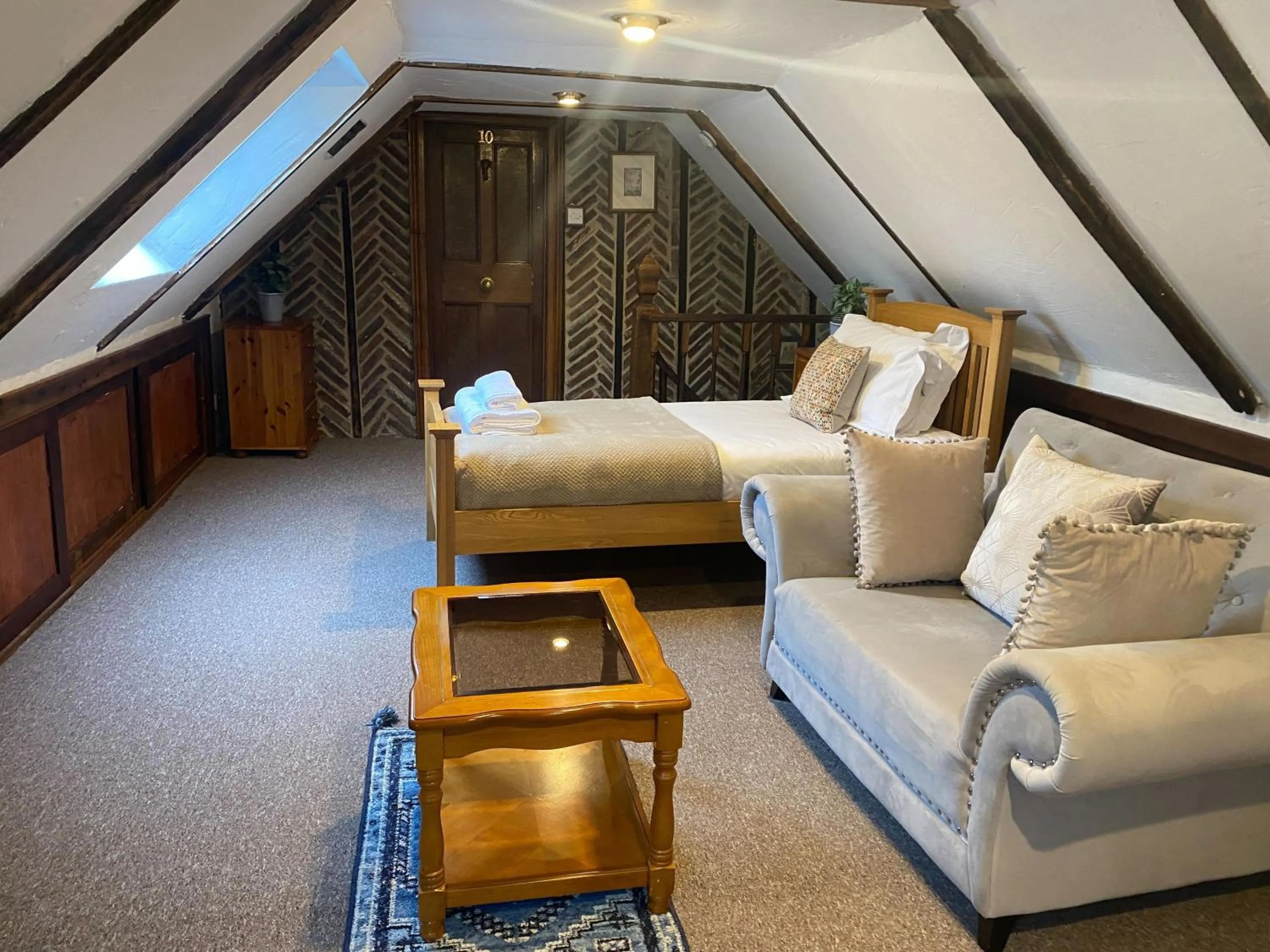 Bed in Dyke Farm Barn near Brighton by Huluki Sussex Stays