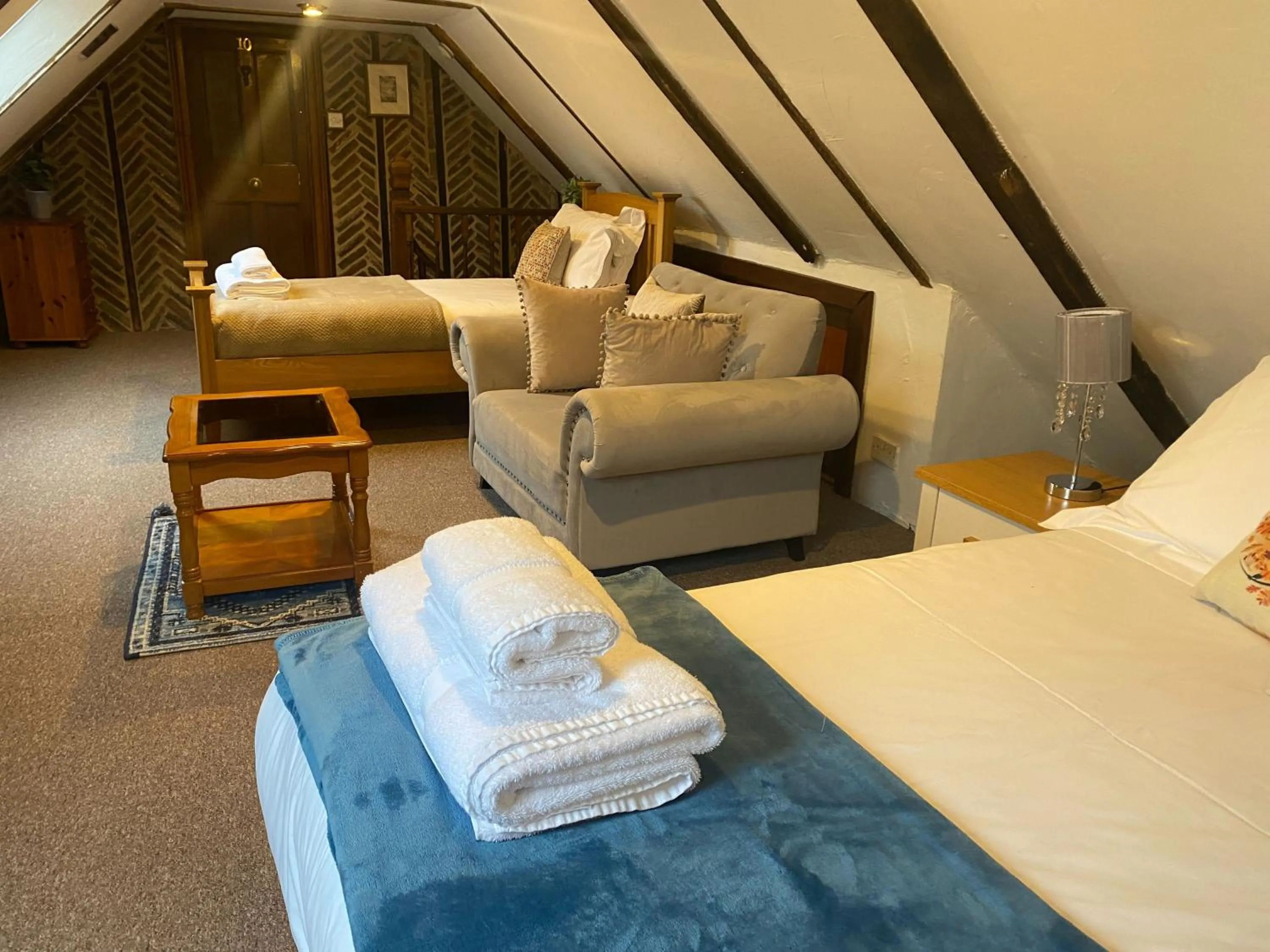 Bed in Dyke Farm Barn near Brighton by Huluki Sussex Stays