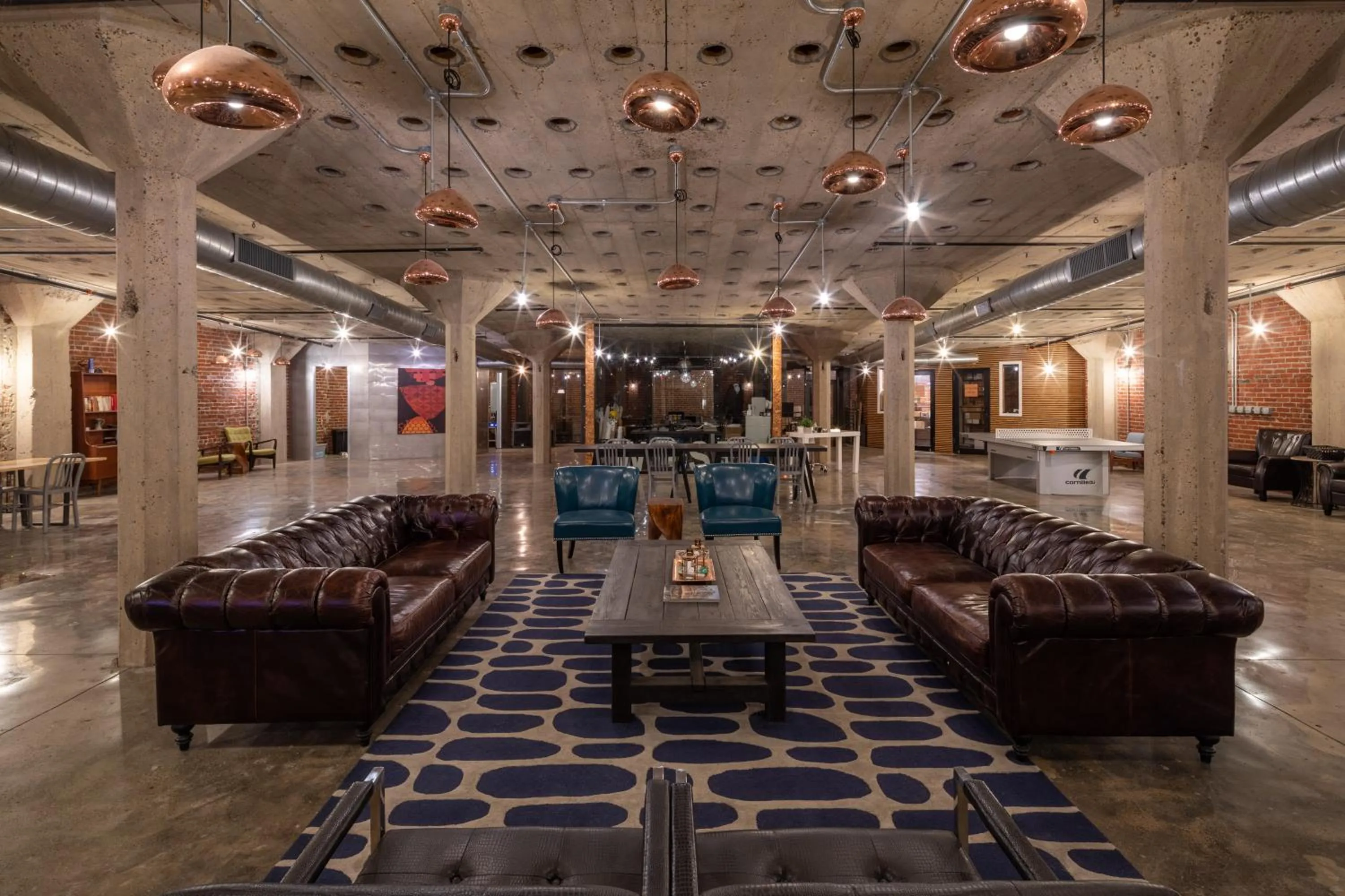 Communal lounge/ TV room in Sosuite at West Lofts - West Philadelphia