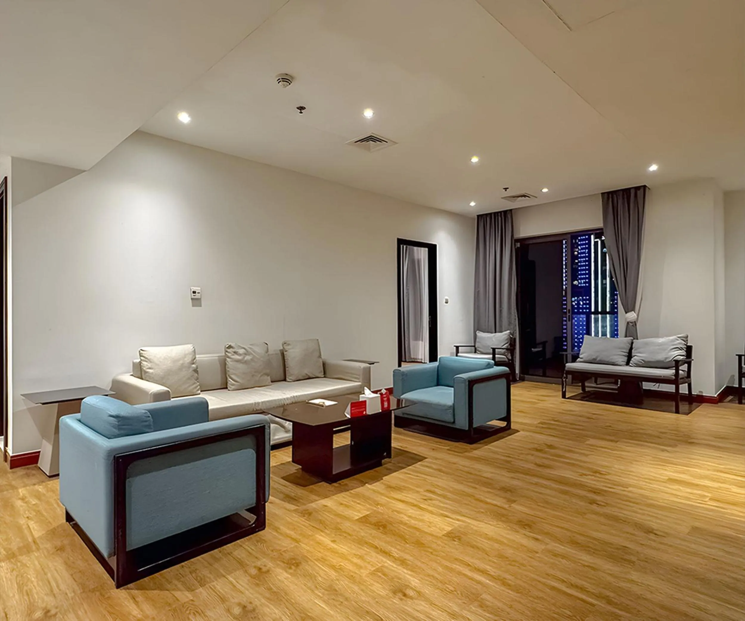 Living room, Bed in Ramada Hotel, Suites and Apartments by Wyndham Dubai JBR