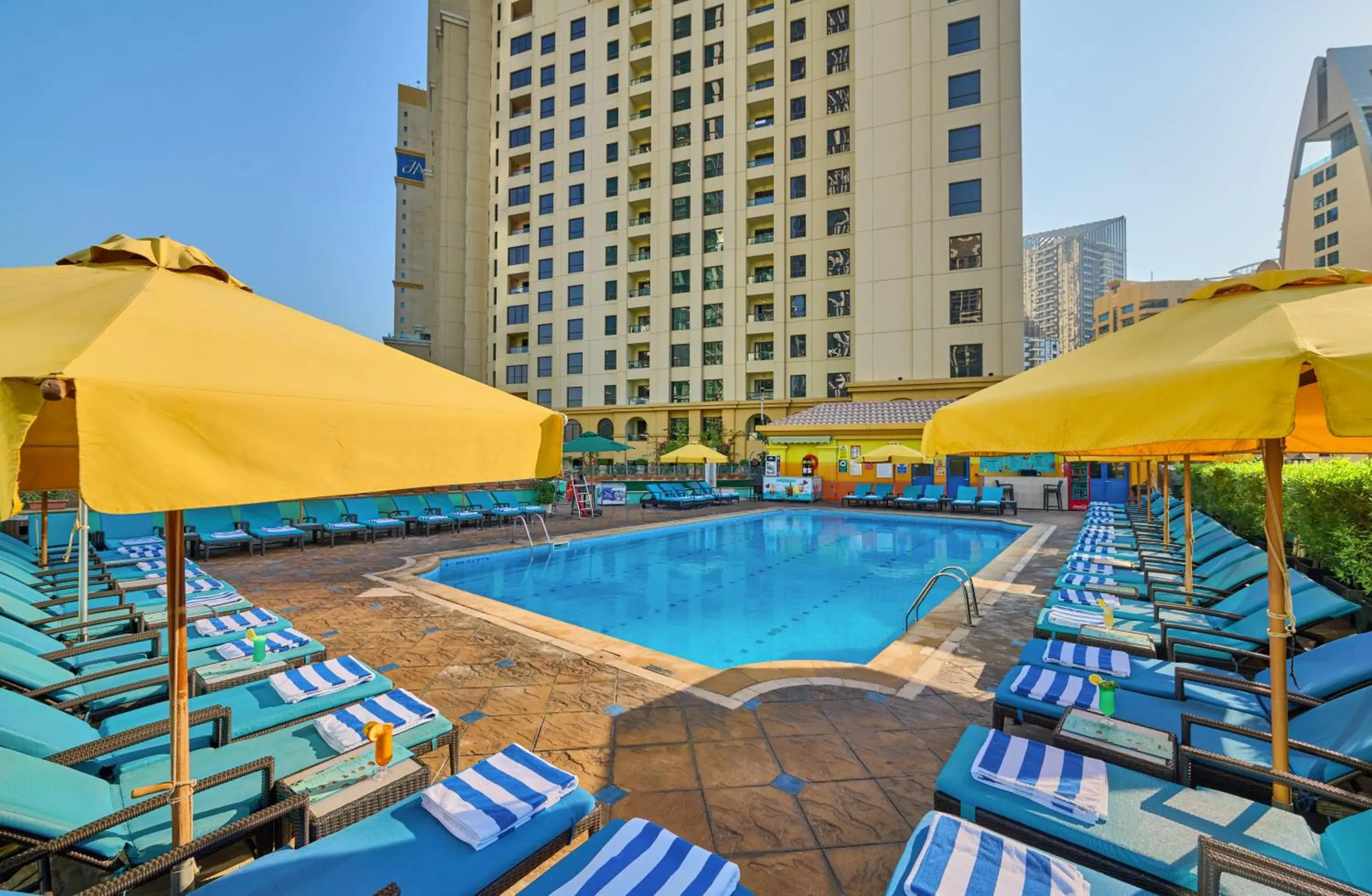 Swimming pool in Ramada Hotel, Suites and Apartments by Wyndham Dubai JBR Swimming pool in Ramada Hotel, Suites and Apartments by Wyndham Dubai JBR