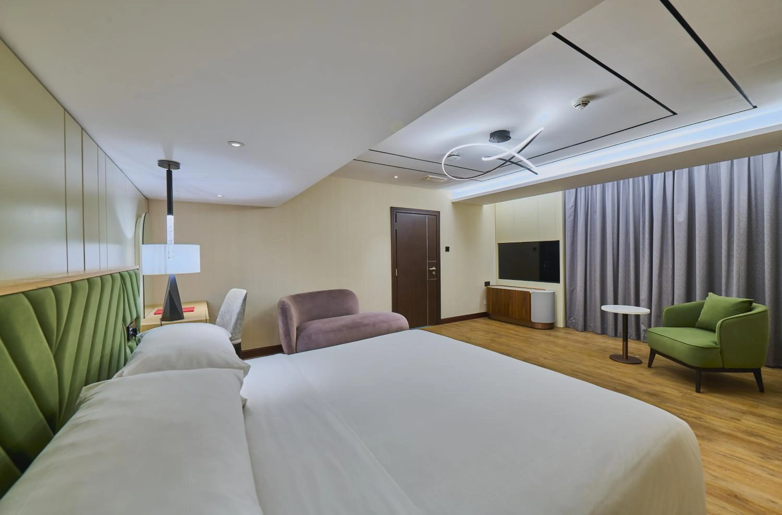 Bed in Ramada Hotel, Suites and Apartments by Wyndham Dubai JBR