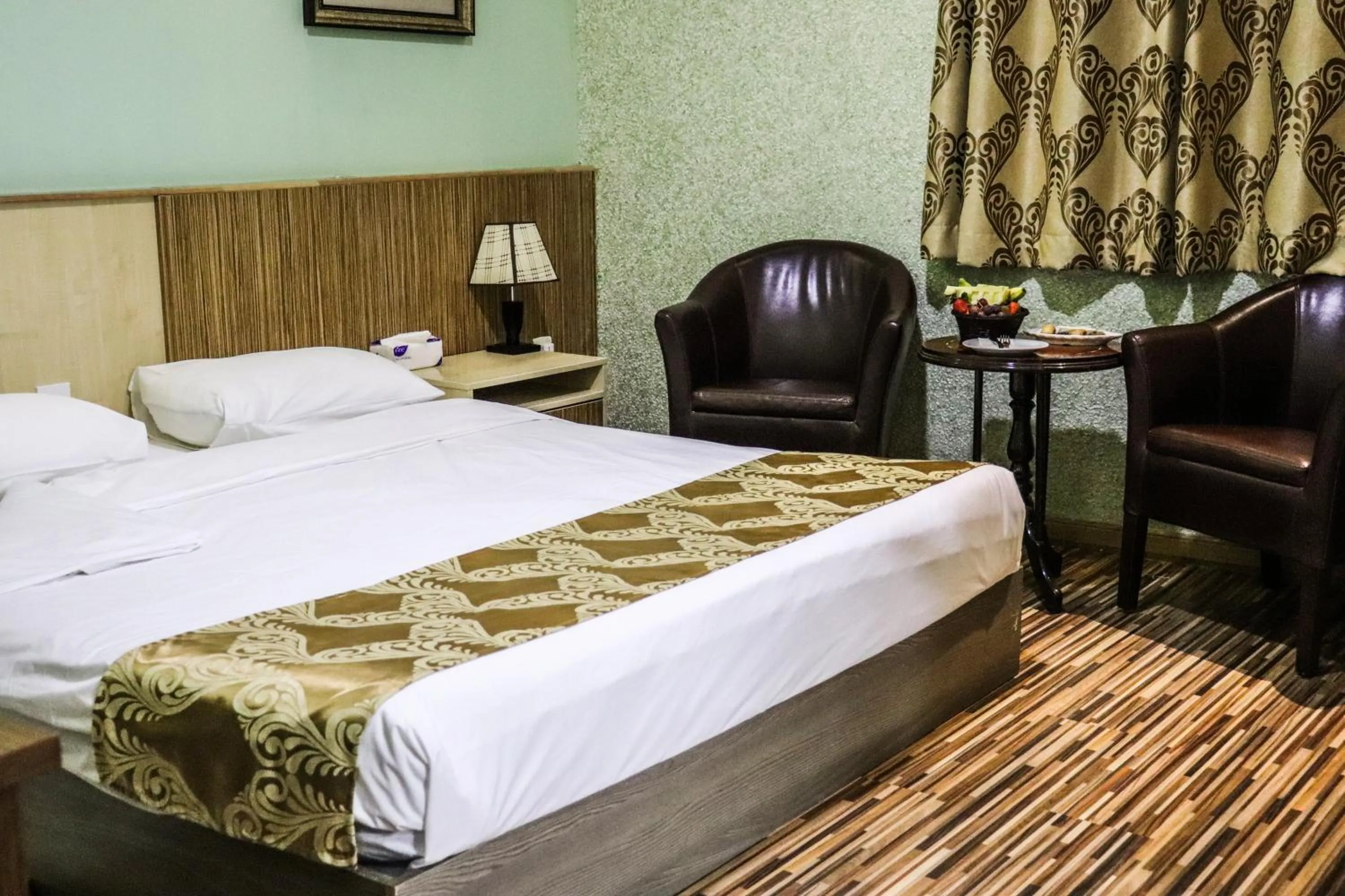 Bed in Palm Hotel