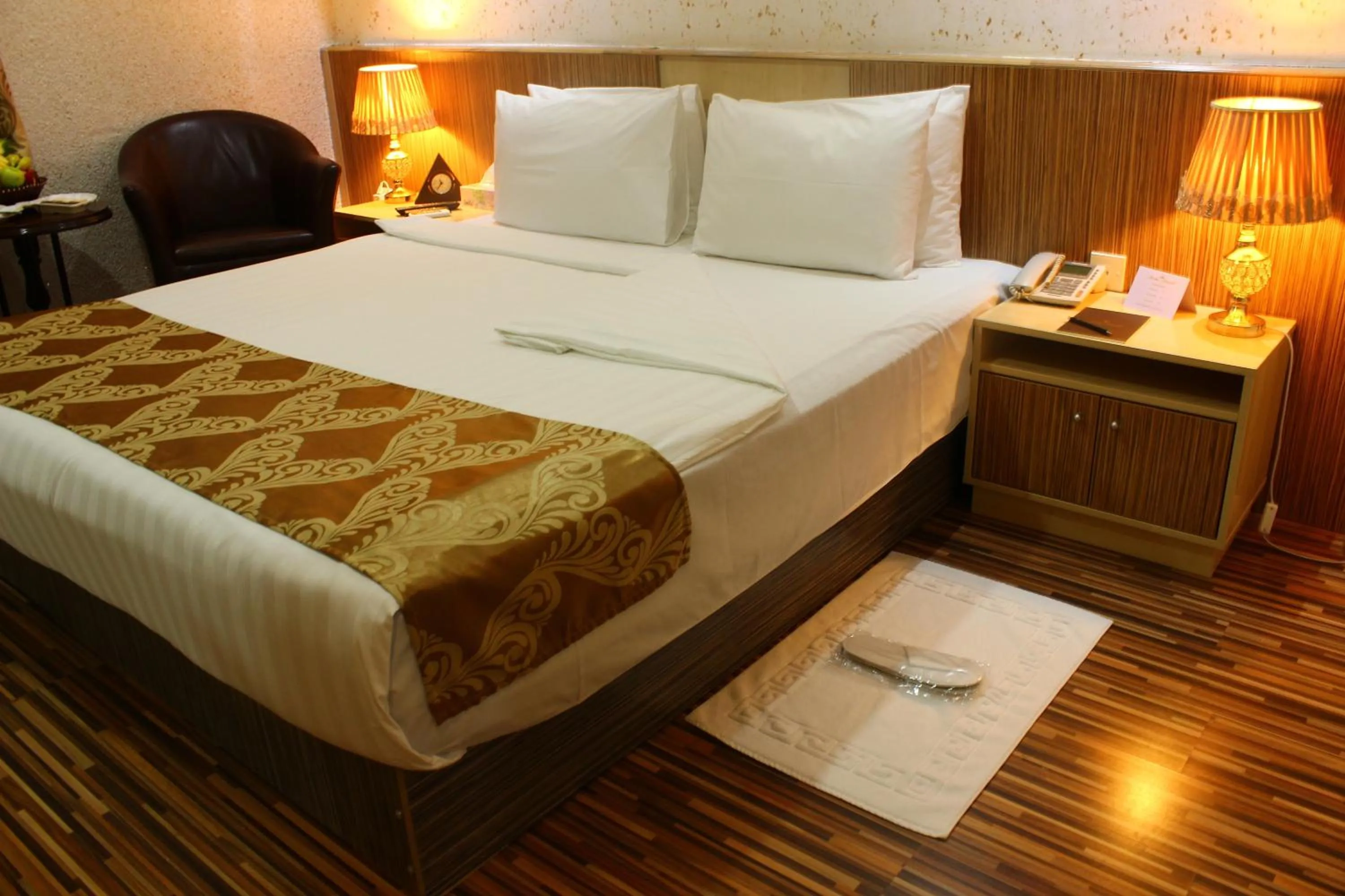 Bed in Palm Hotel