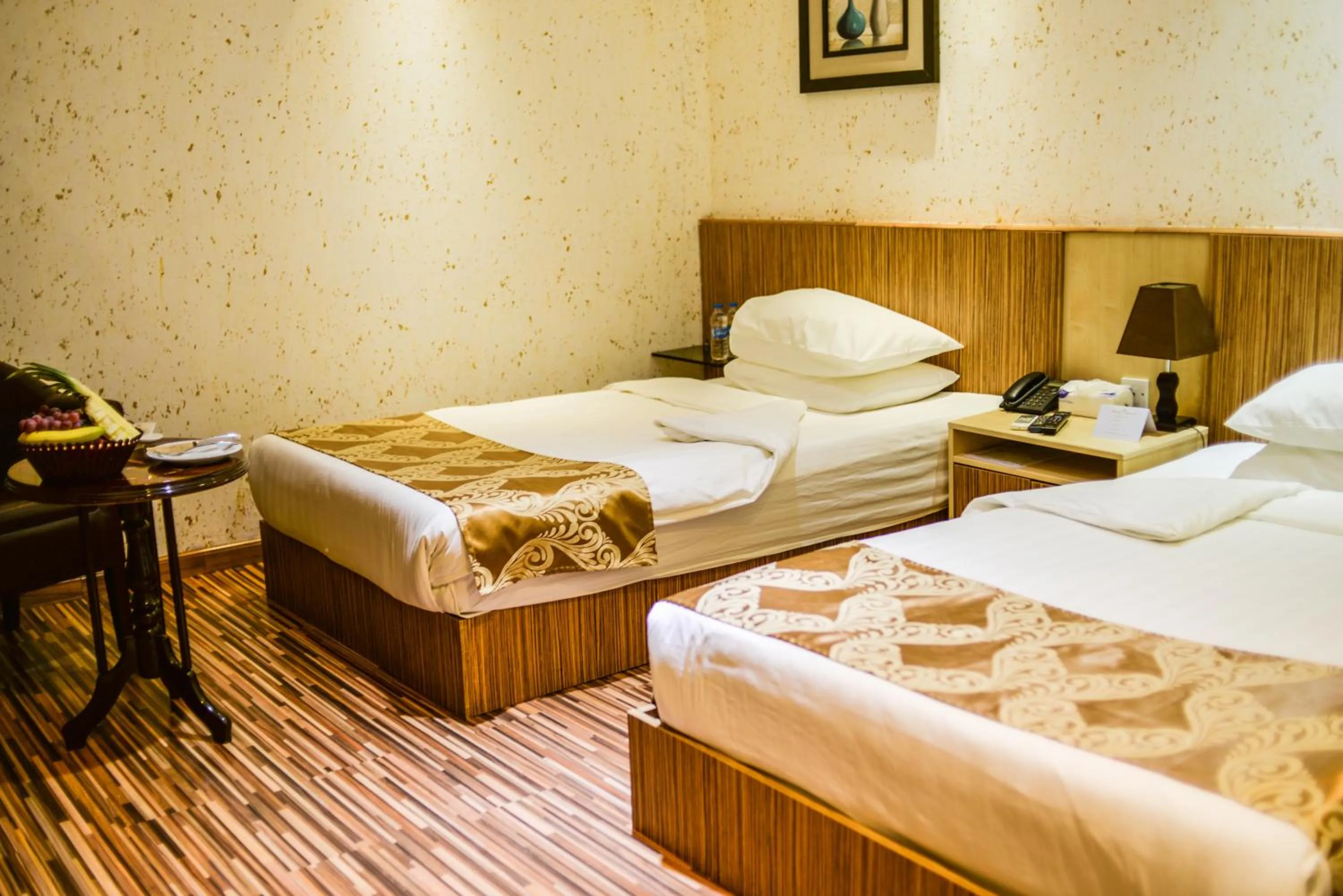 Bed in Palm Hotel