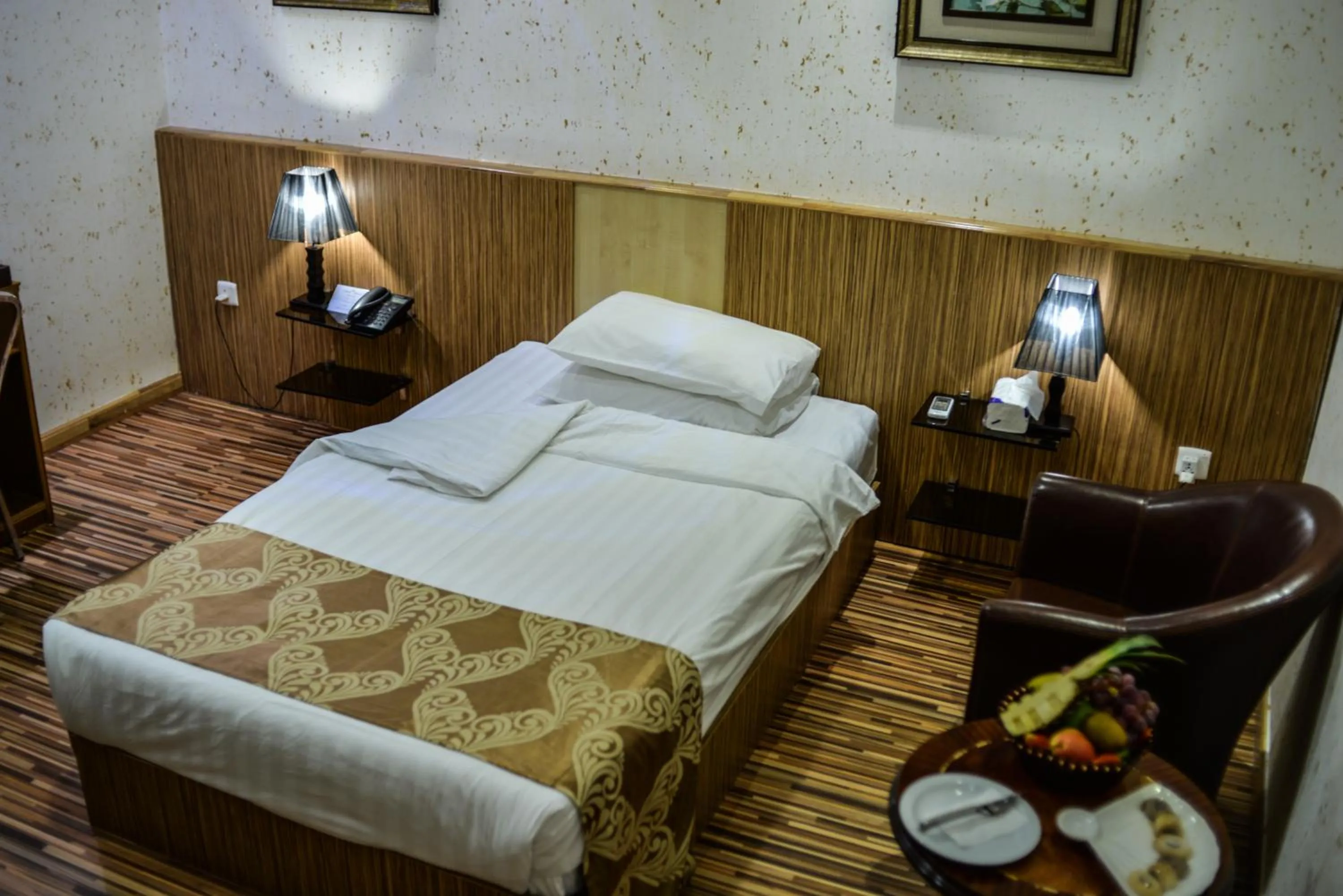 Bed in Palm Hotel