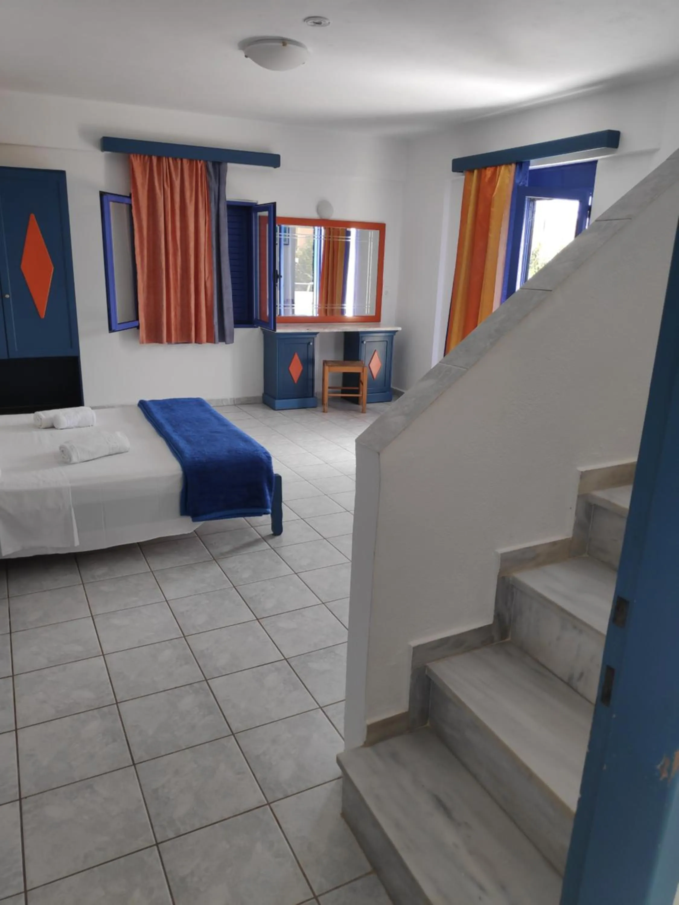 Dining area, Bed in Leonidas Studios & Apartments