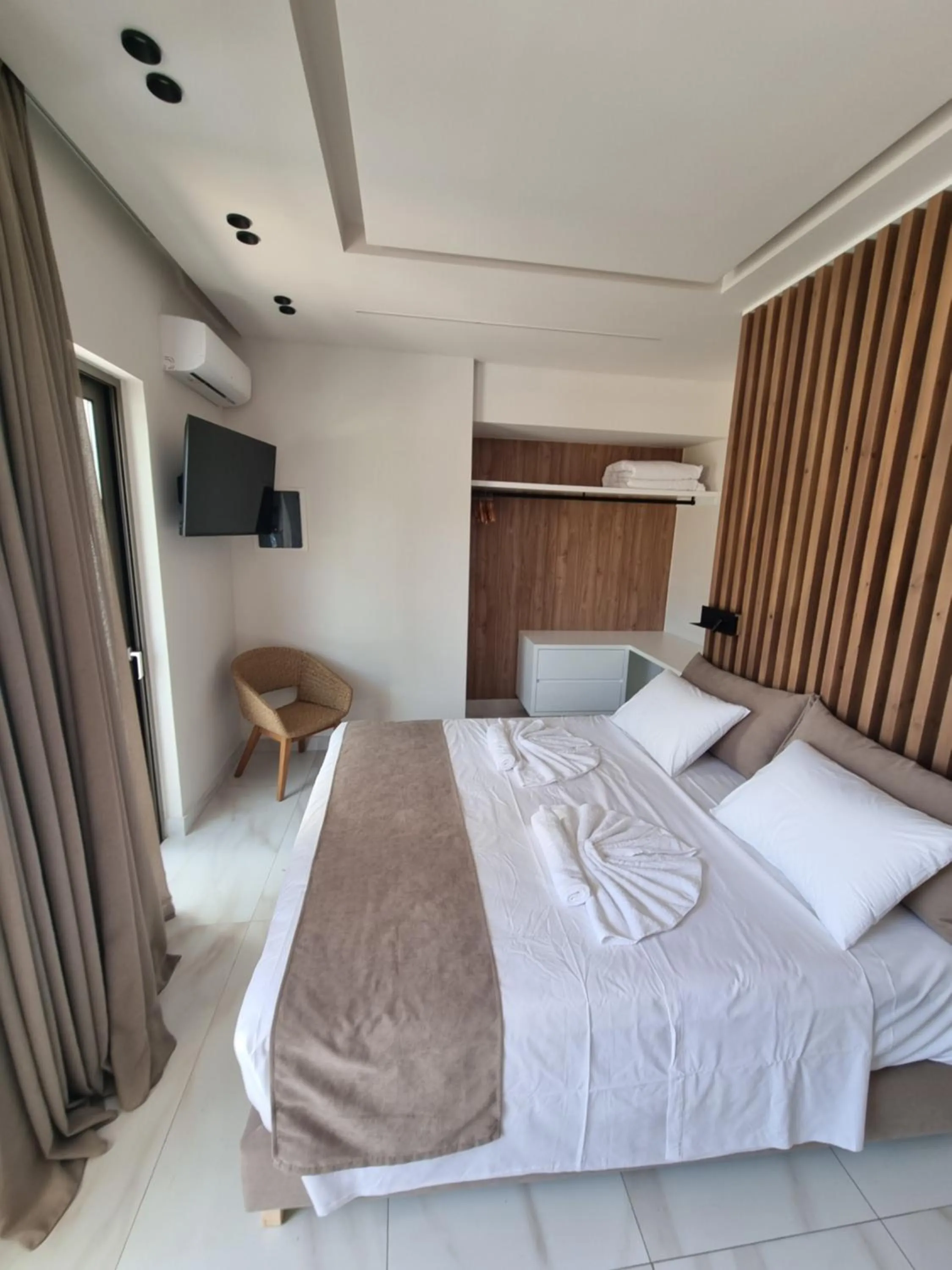 Bed in Leonidas Studios & Apartments