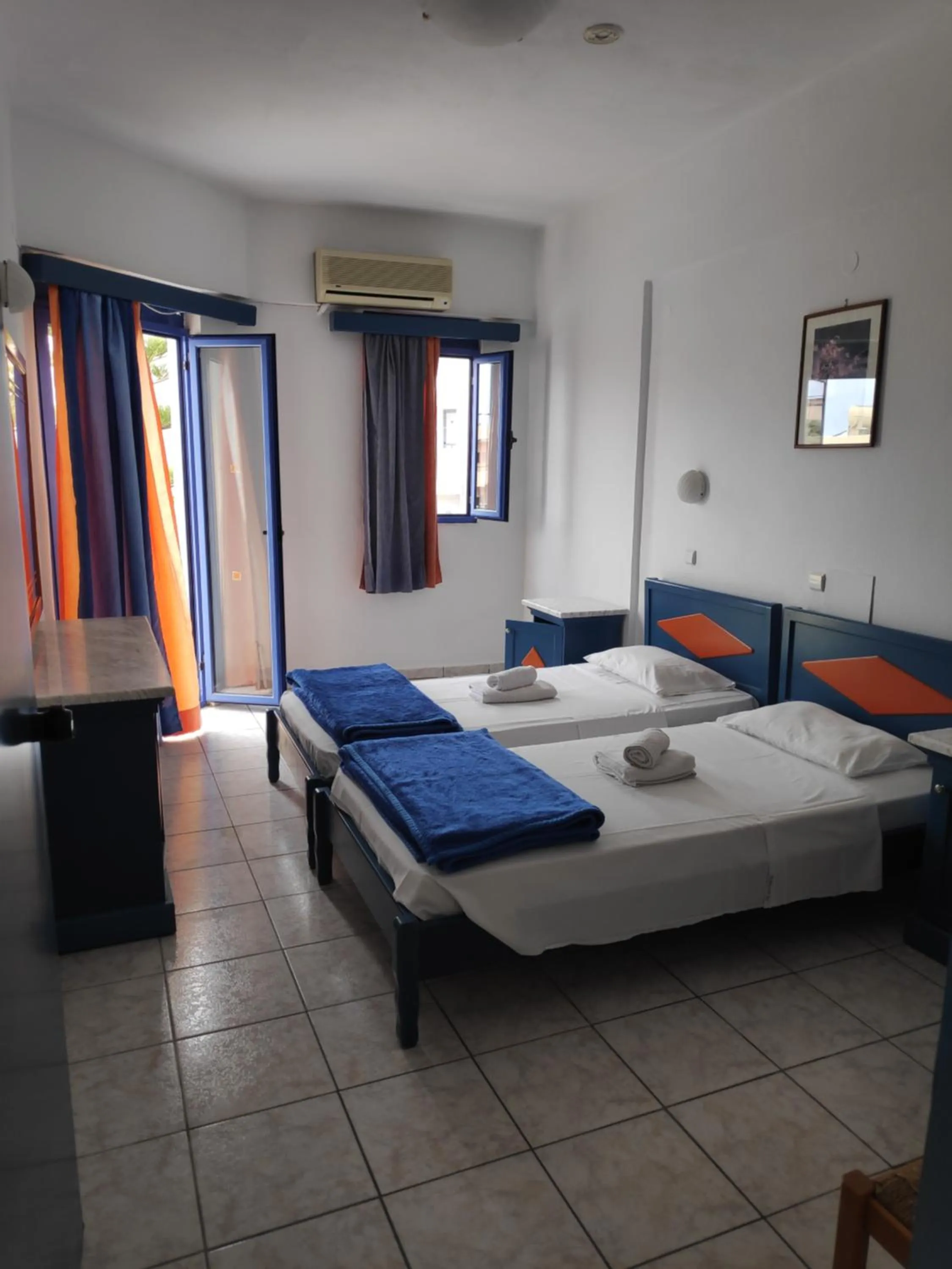 Bed in Leonidas Studios & Apartments