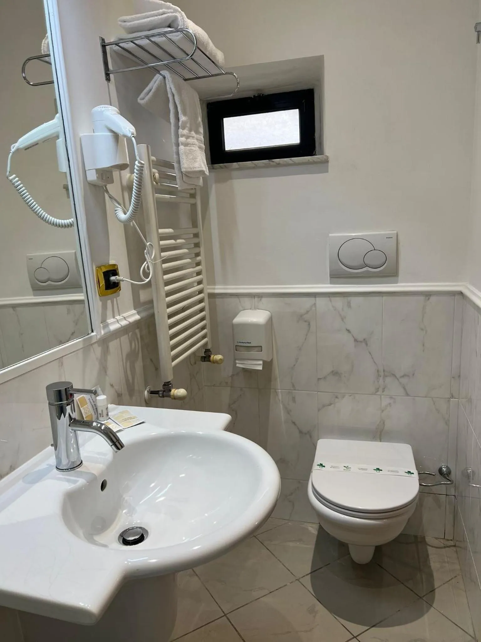 Bathroom in CANELLA HOTEL