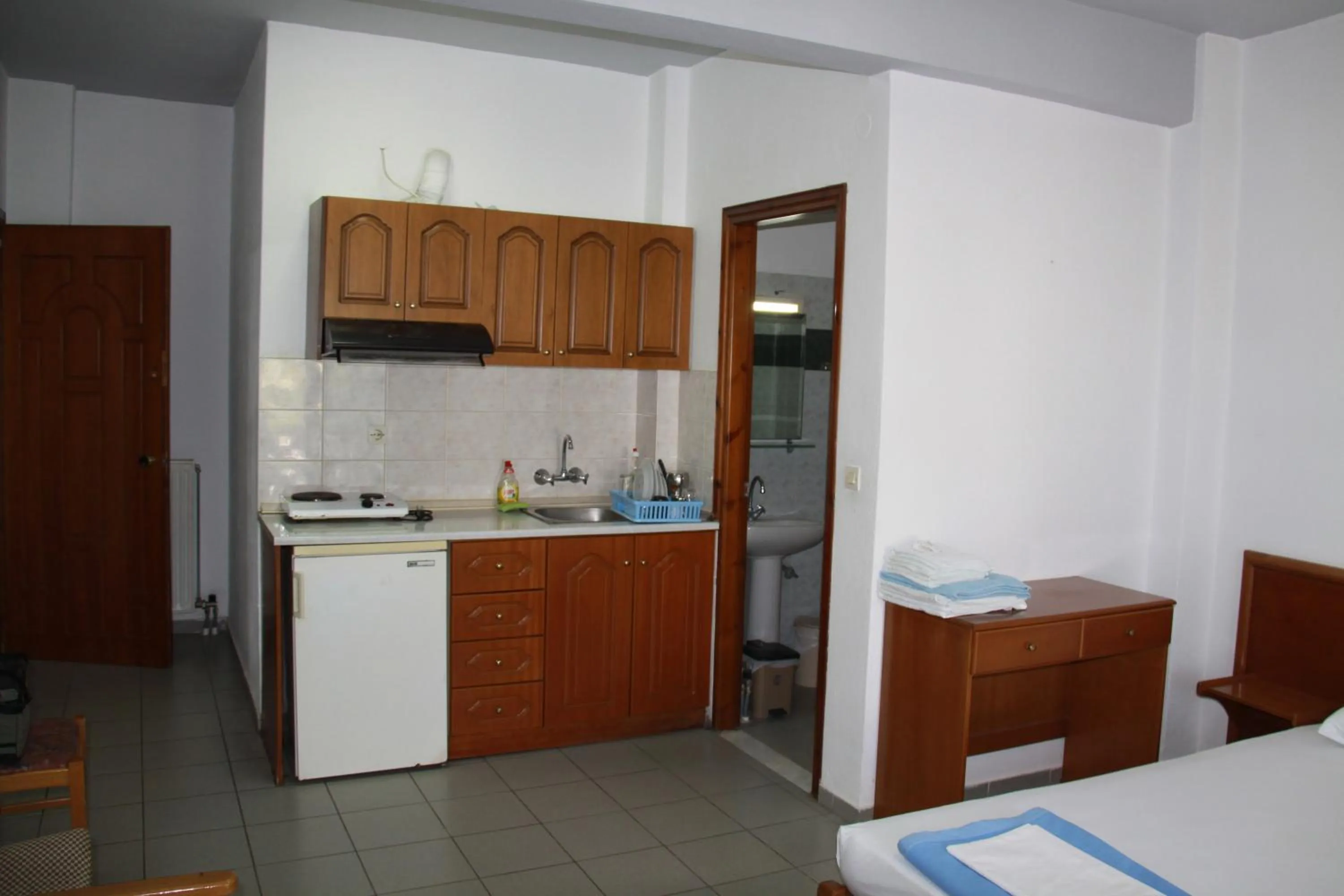 Kitchen or kitchenette in Galanis Studios and Apartments