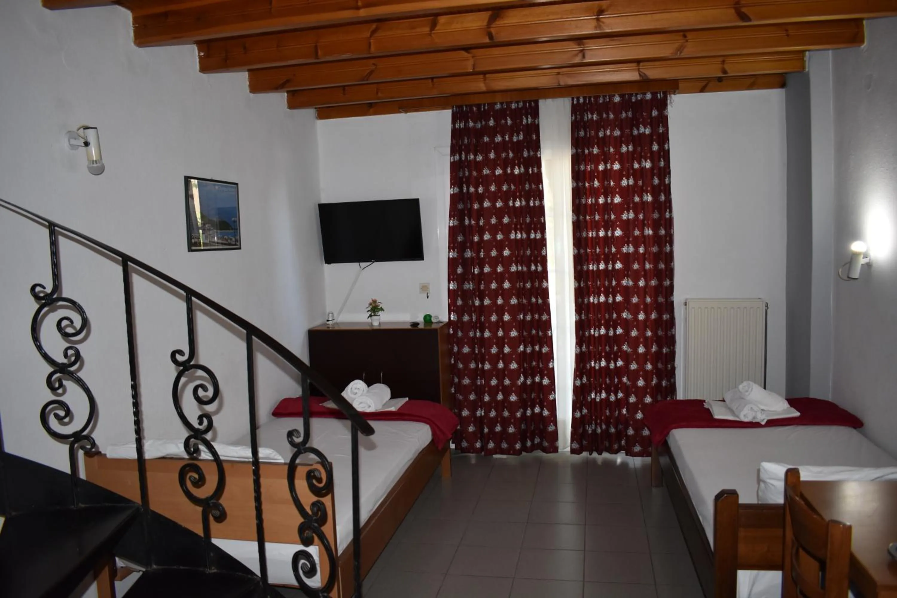 Bed in Galanis Studios and Apartments