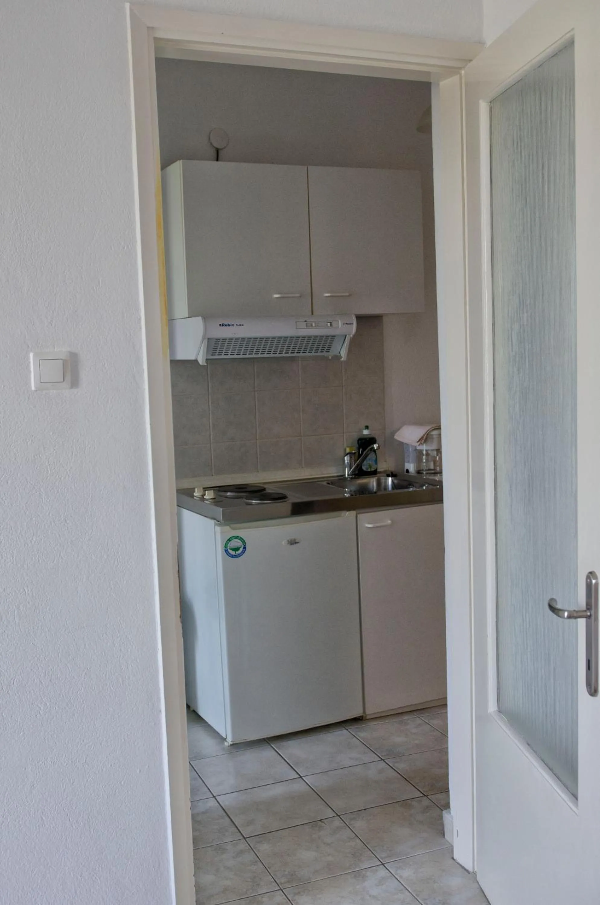 Kitchen or kitchenette in Galini Apartments
