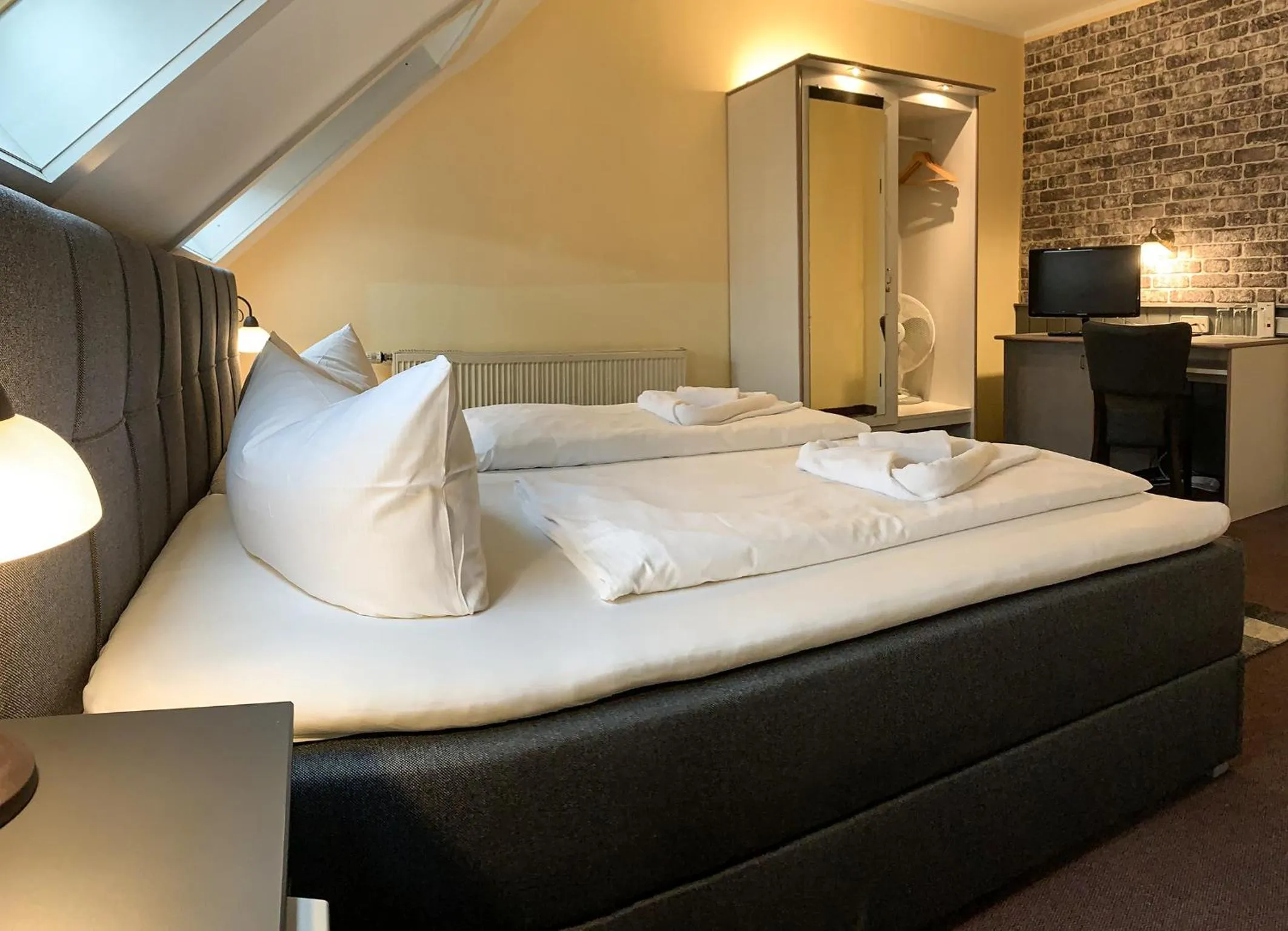 Photo of the whole room, Bed in Hotel Carl von Clausewitz