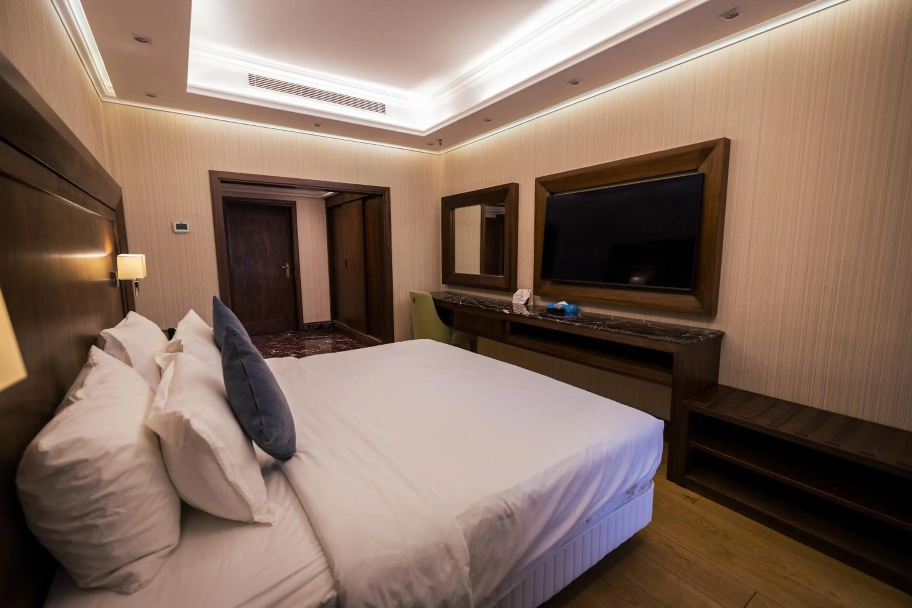 Bed in Jeddah Grand Hotel