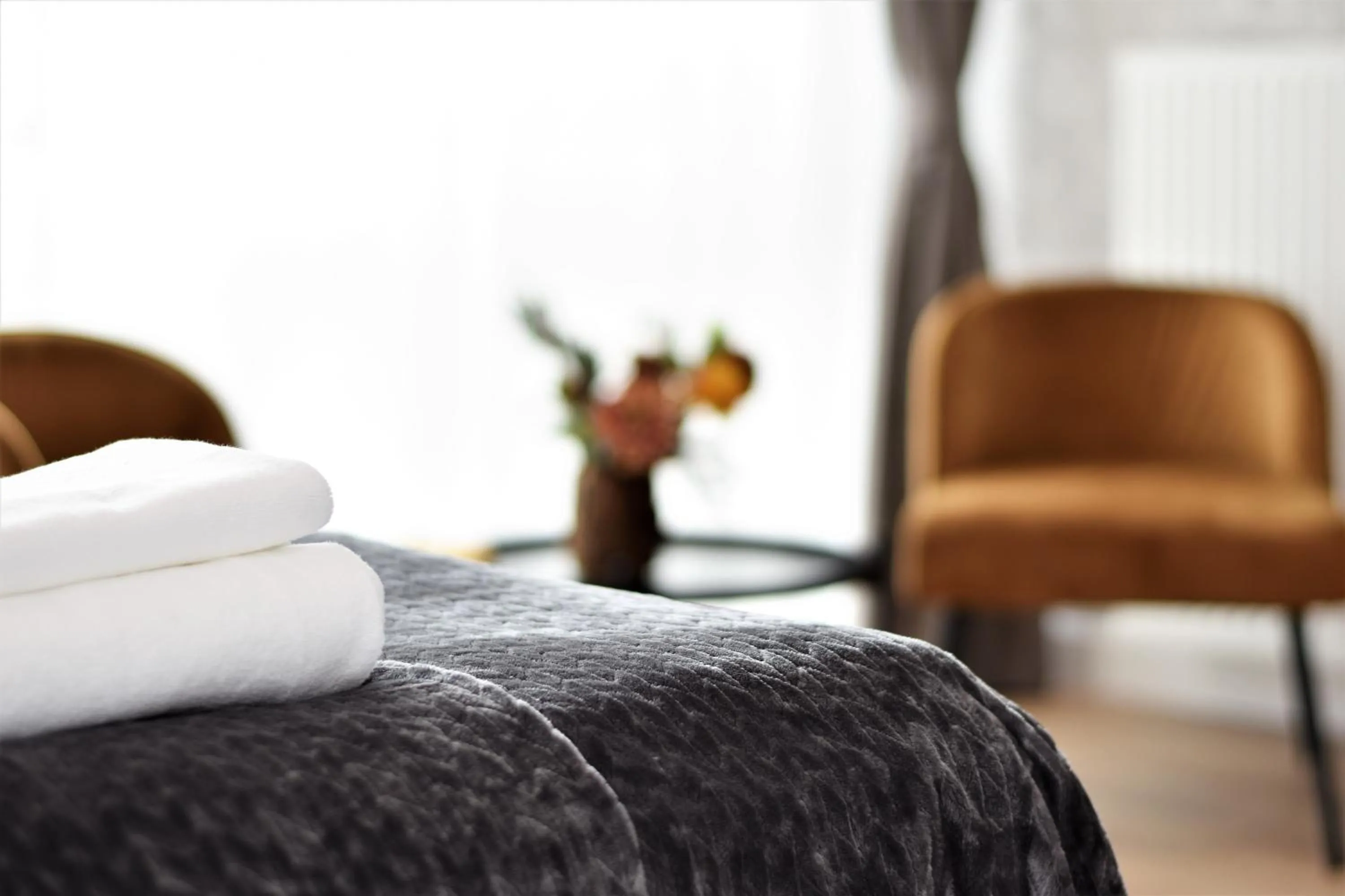 Bed in Patio Riverfront Aparthotel