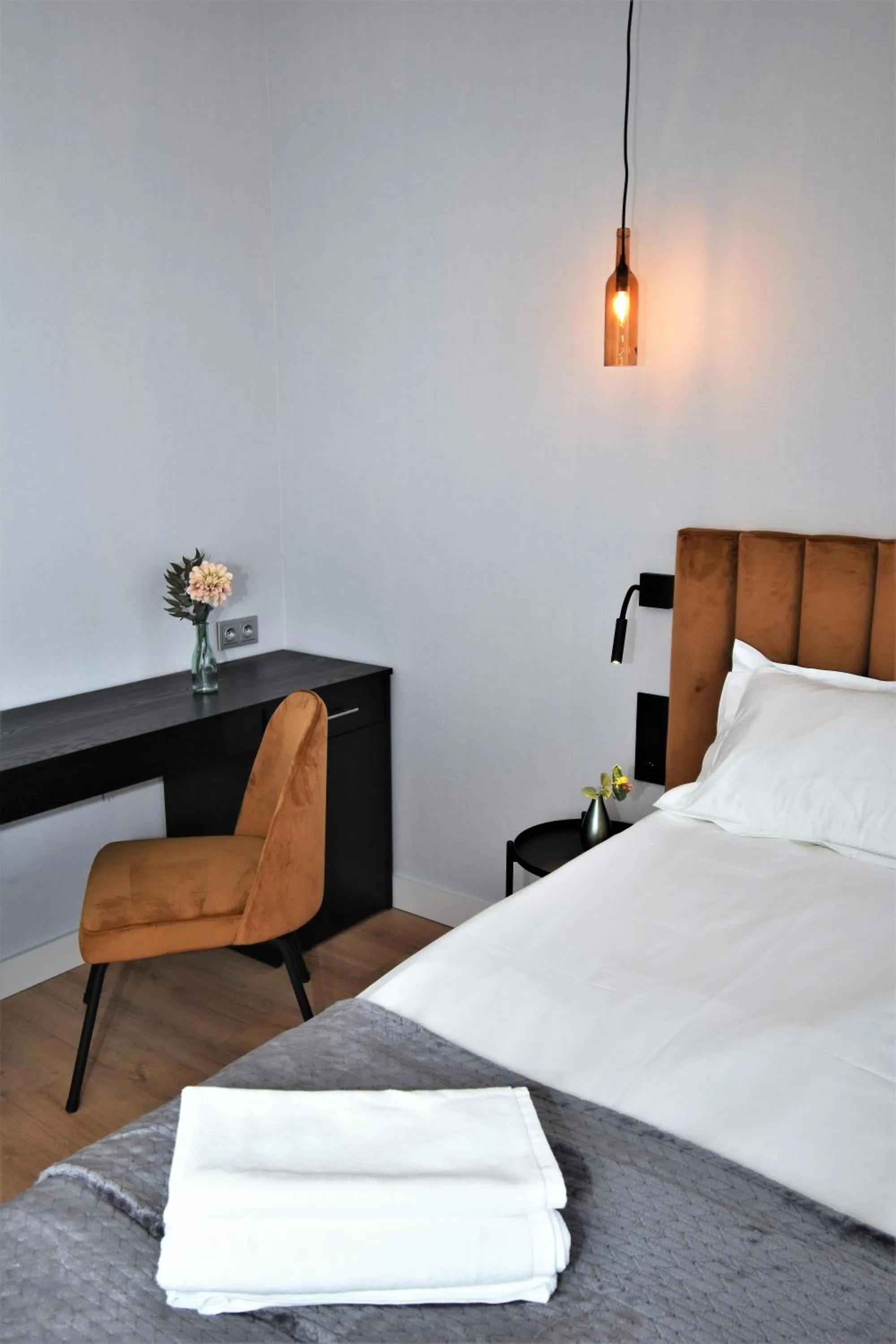 Bed in Patio Riverfront Aparthotel