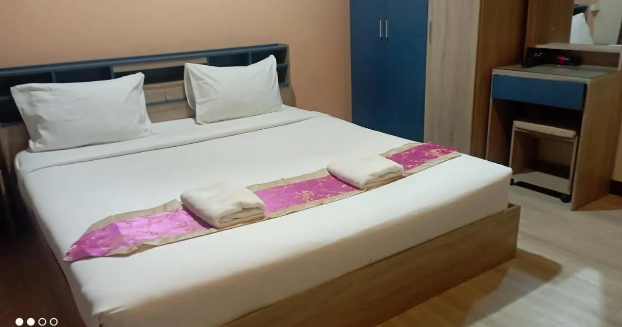 Bed in Supachai Inn