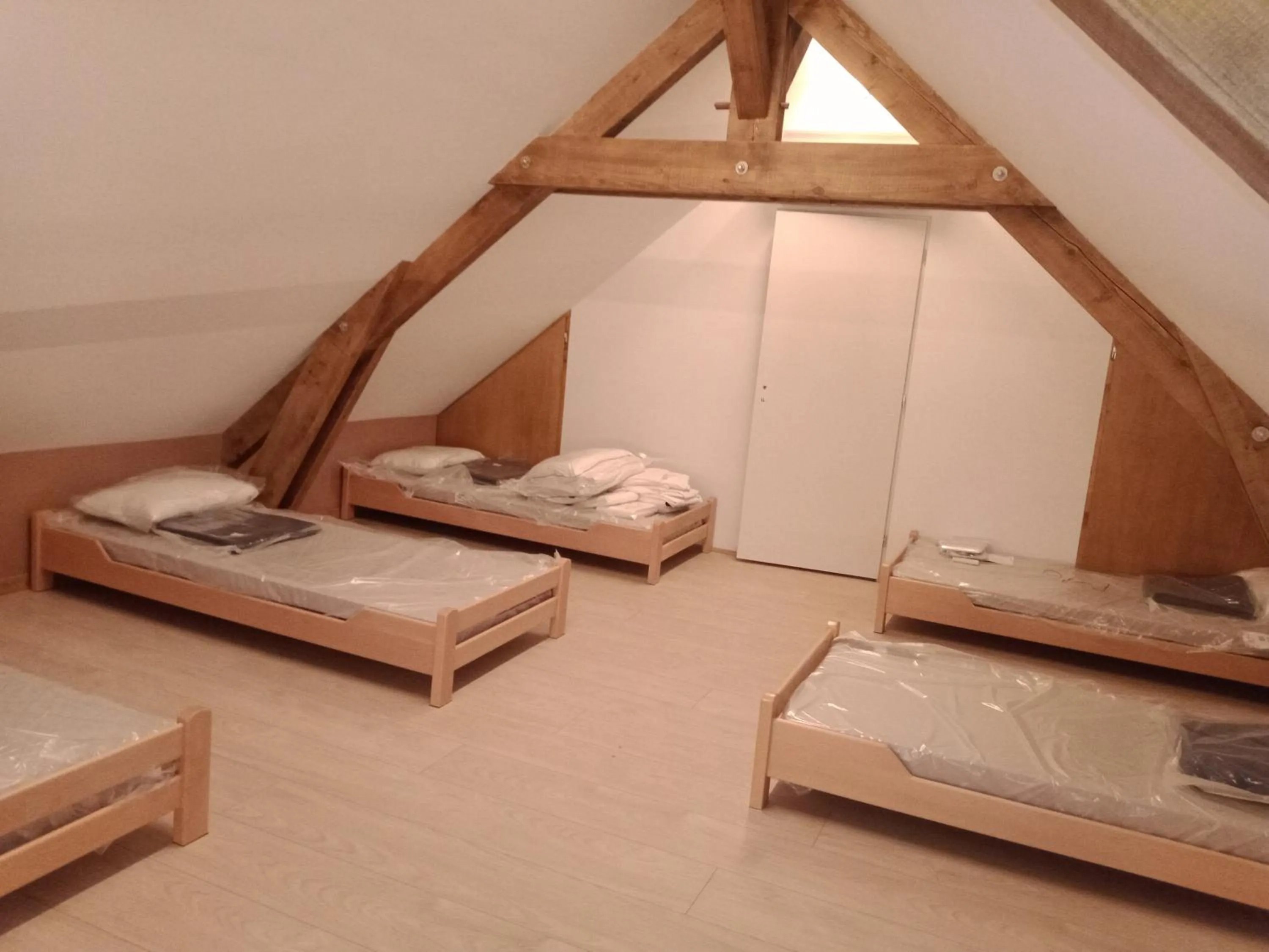Bed in Le Baugyte - Gite de GROUPE - 14 lits simples