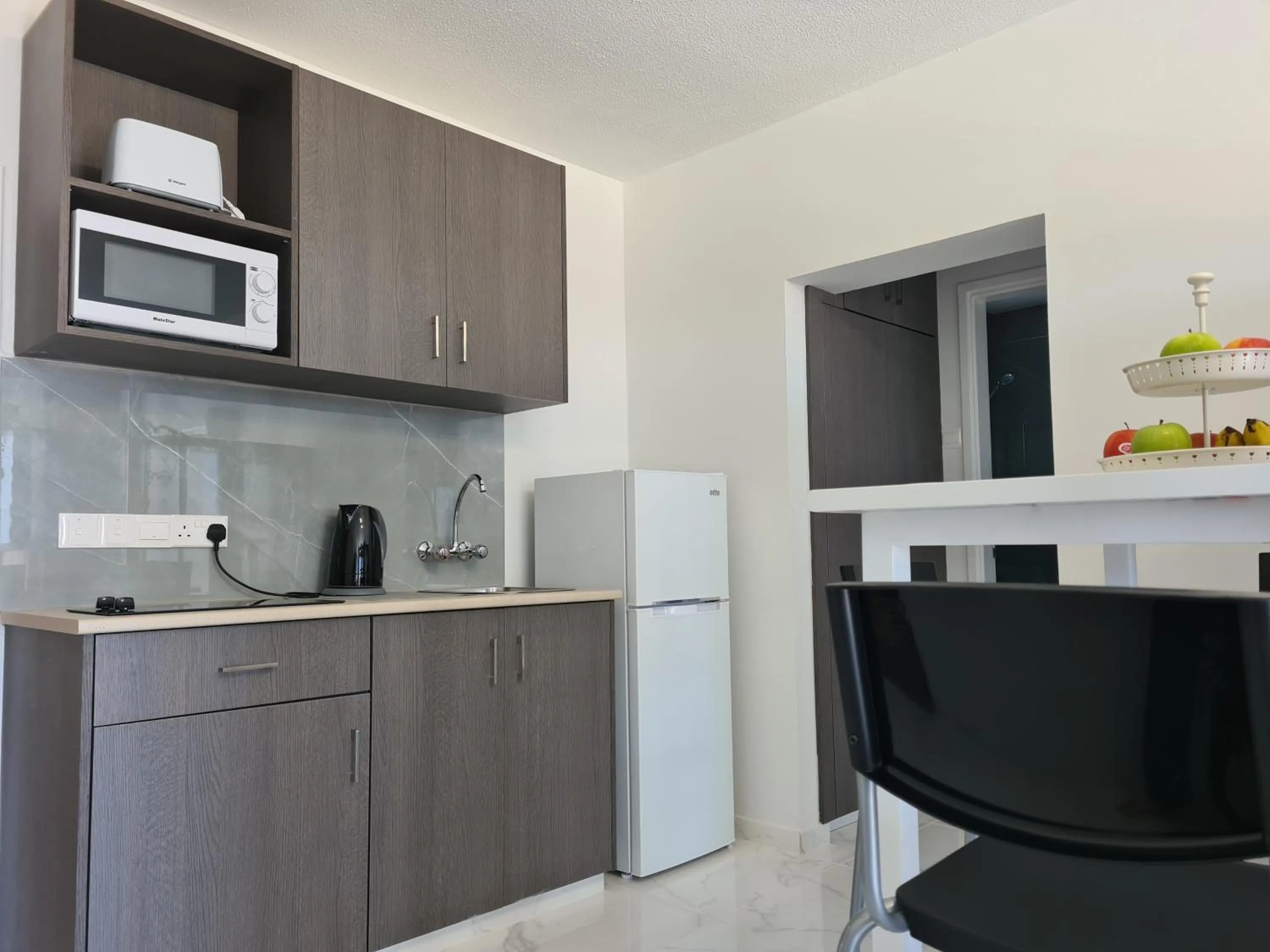 Kitchen or kitchenette in Fotoxenia Luxury Apts
