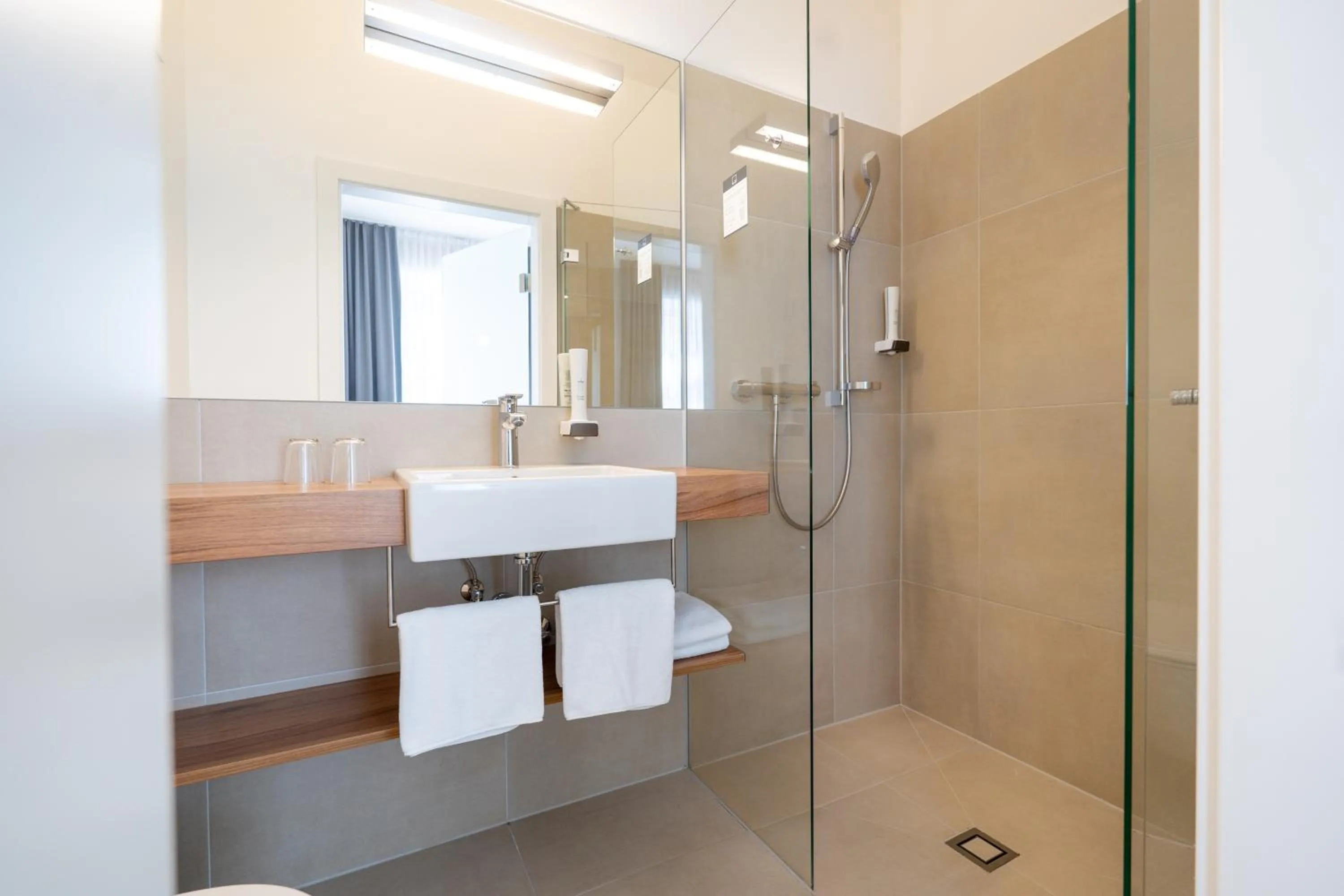 Shower in Das Jedermann Boutiquehotel mit Stadtgarten