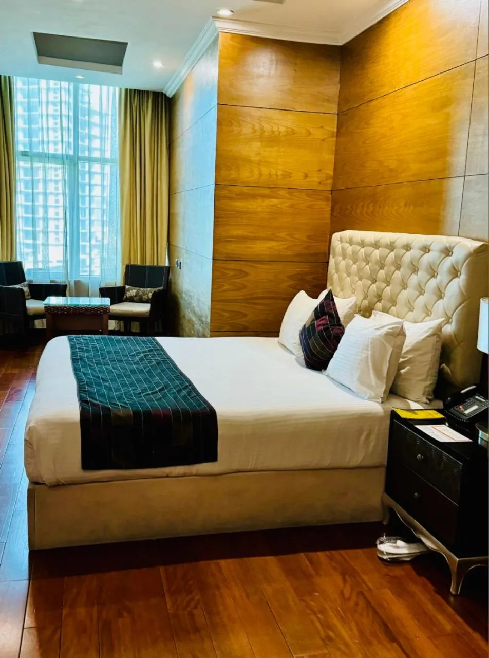 Bed in Inter Luxury Hotel