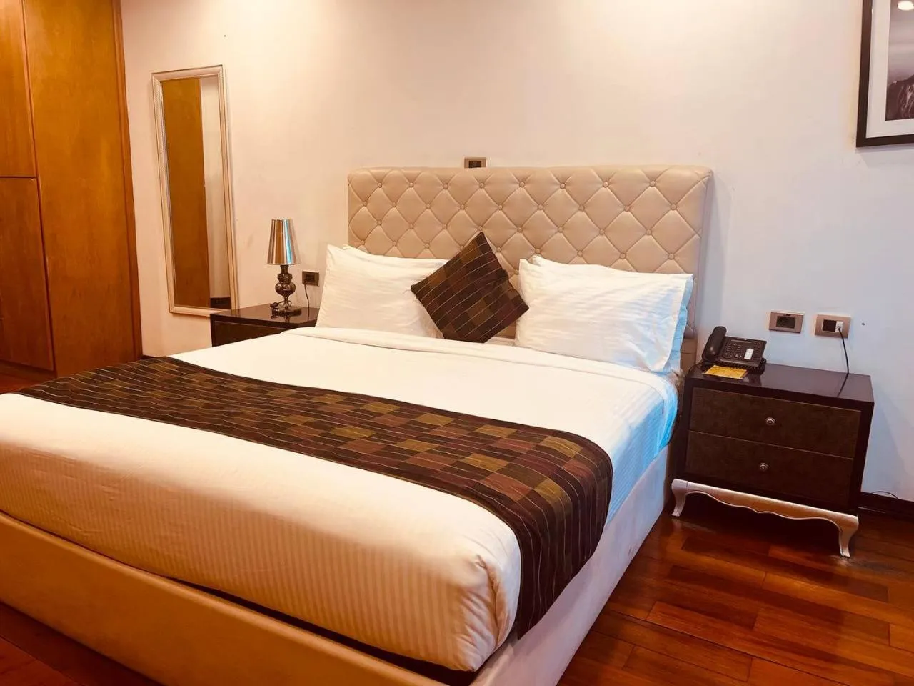 Bed in Inter Luxury Hotel