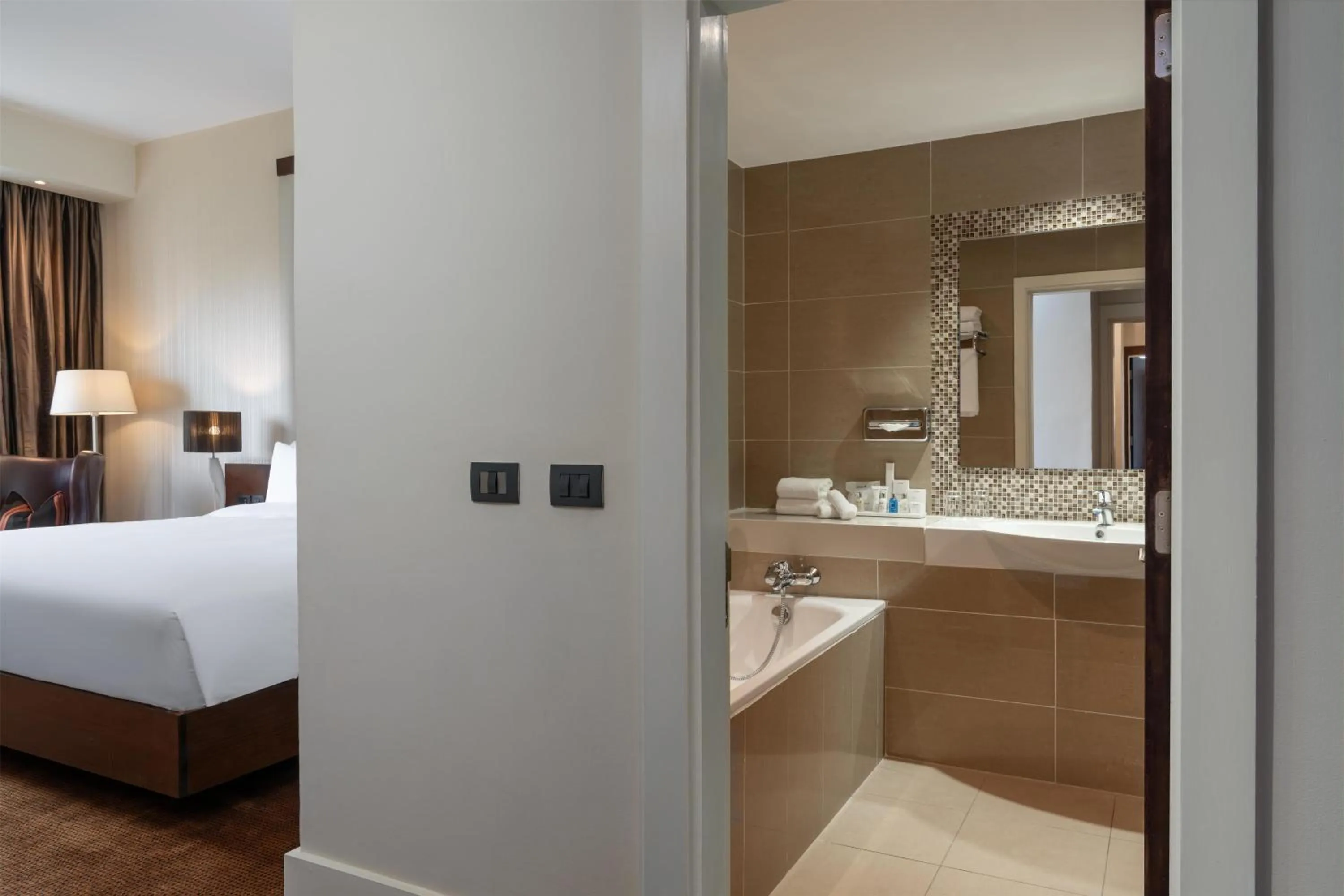 Bathroom, Bed in Radisson Blu Hotel, Addis Ababa