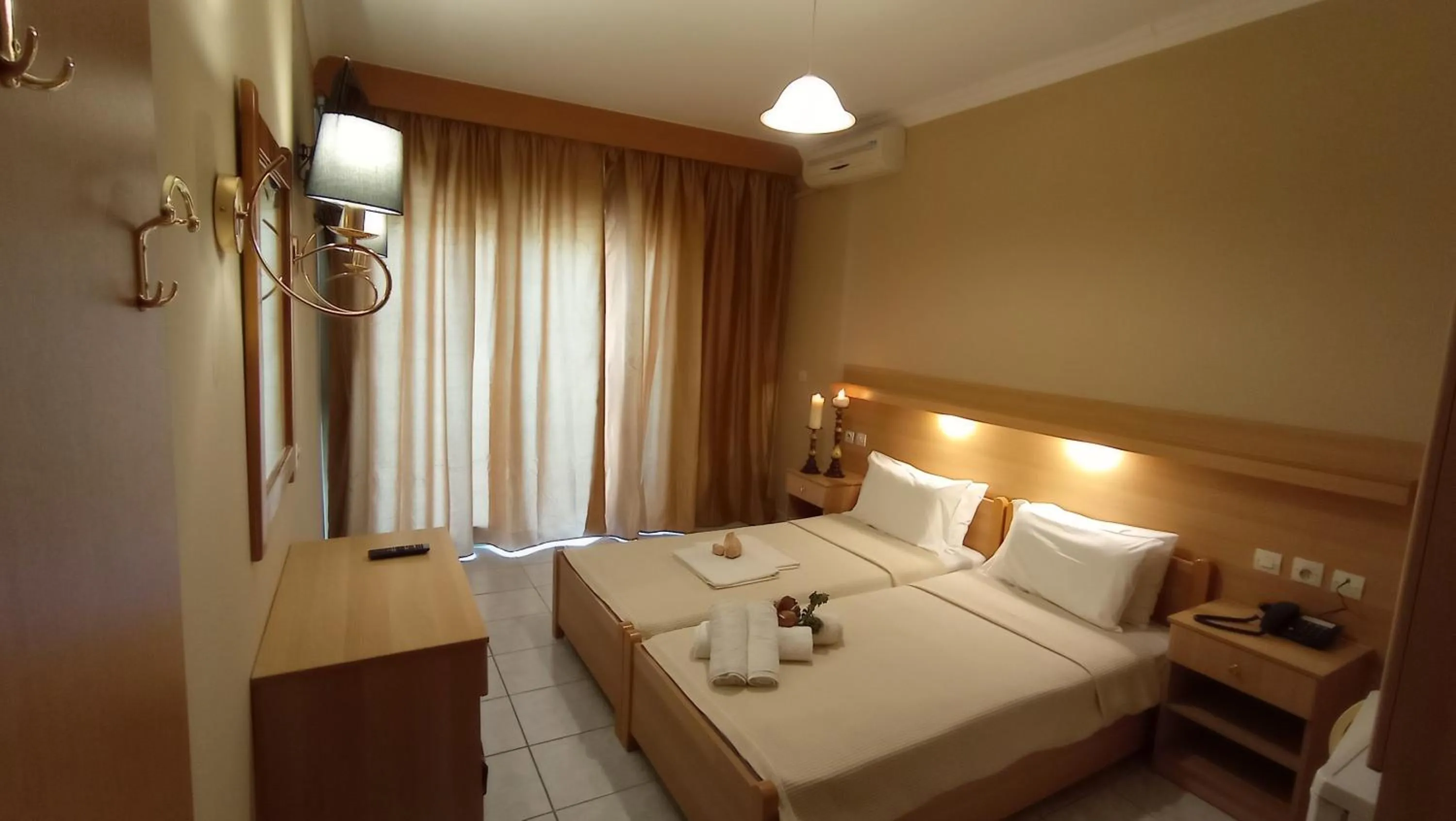 Photo of the whole room, Bed in THEMIS BEACH