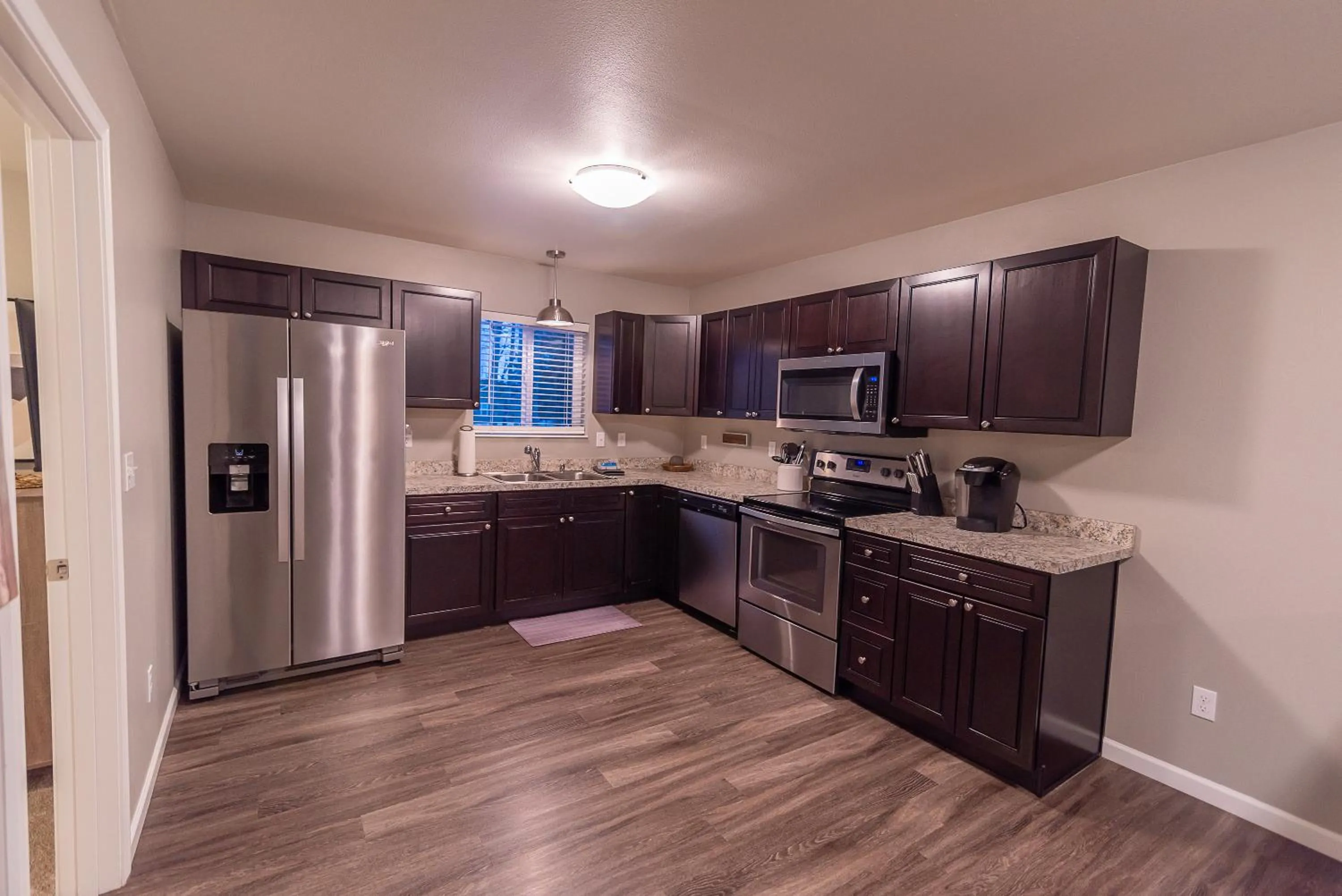 Kitchen or kitchenette in Susitna Suites